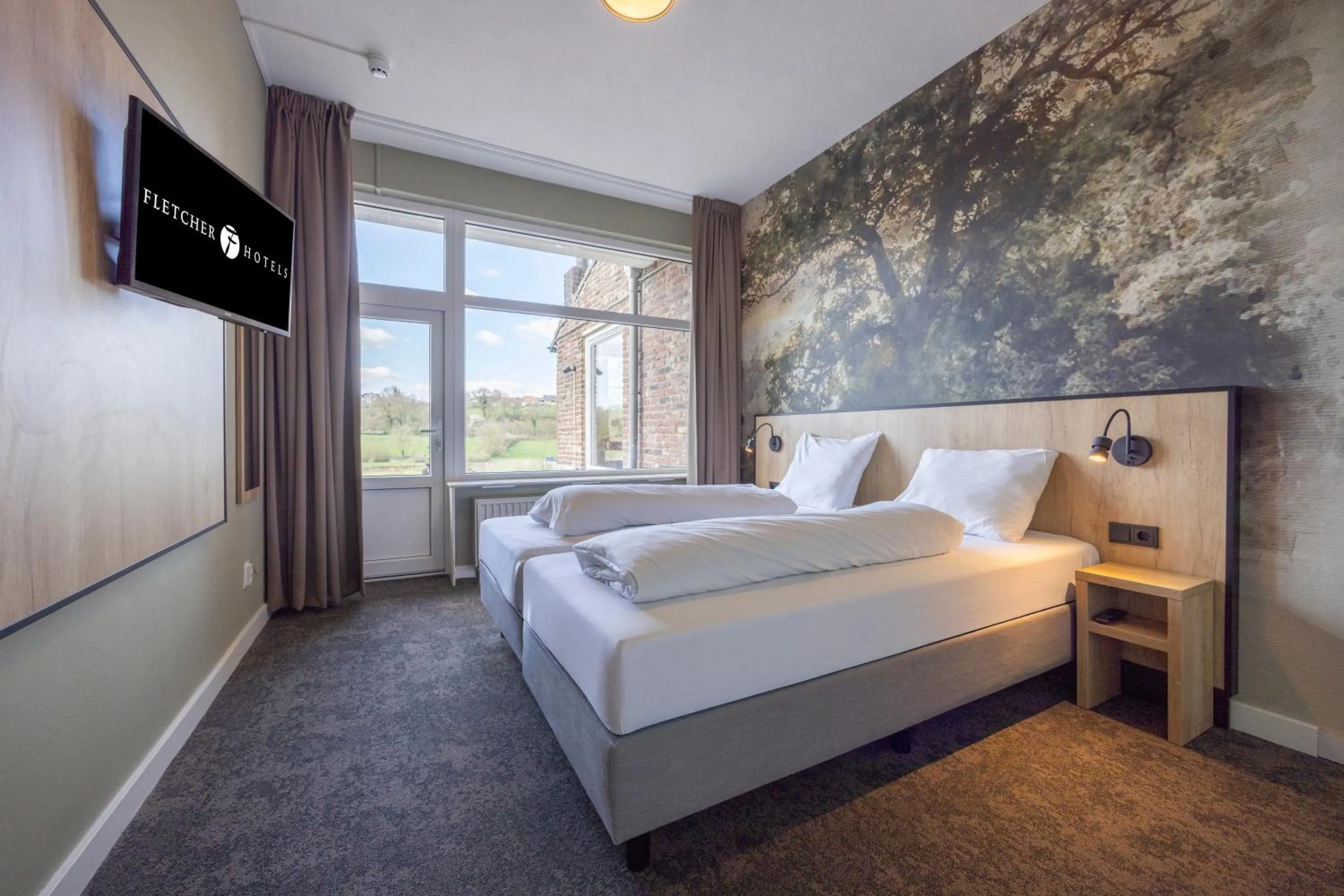 Bed in Fletcher Hotel Restaurant Bon Repos