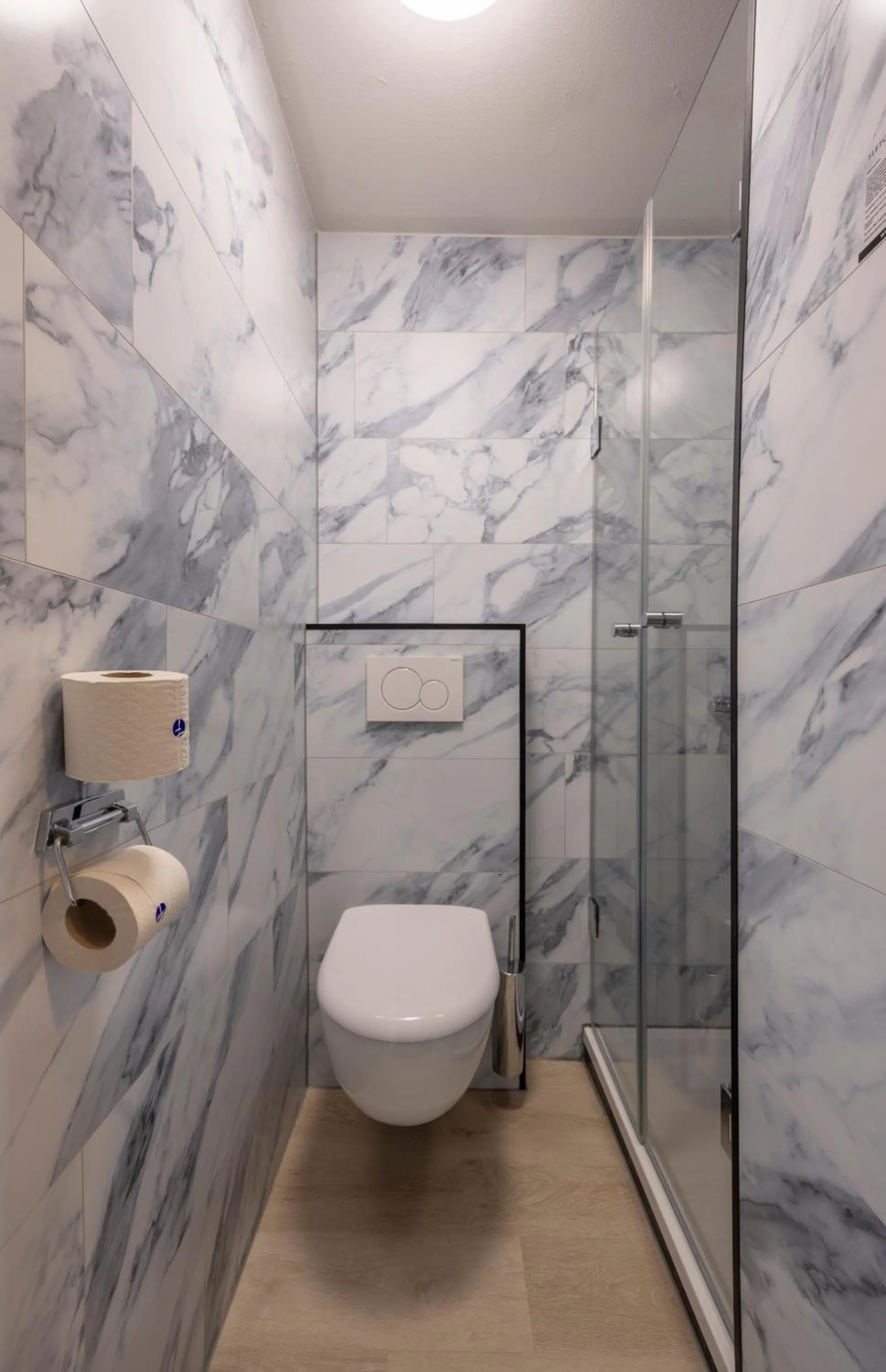 Toilet in Fletcher Hotel Restaurant Bon Repos