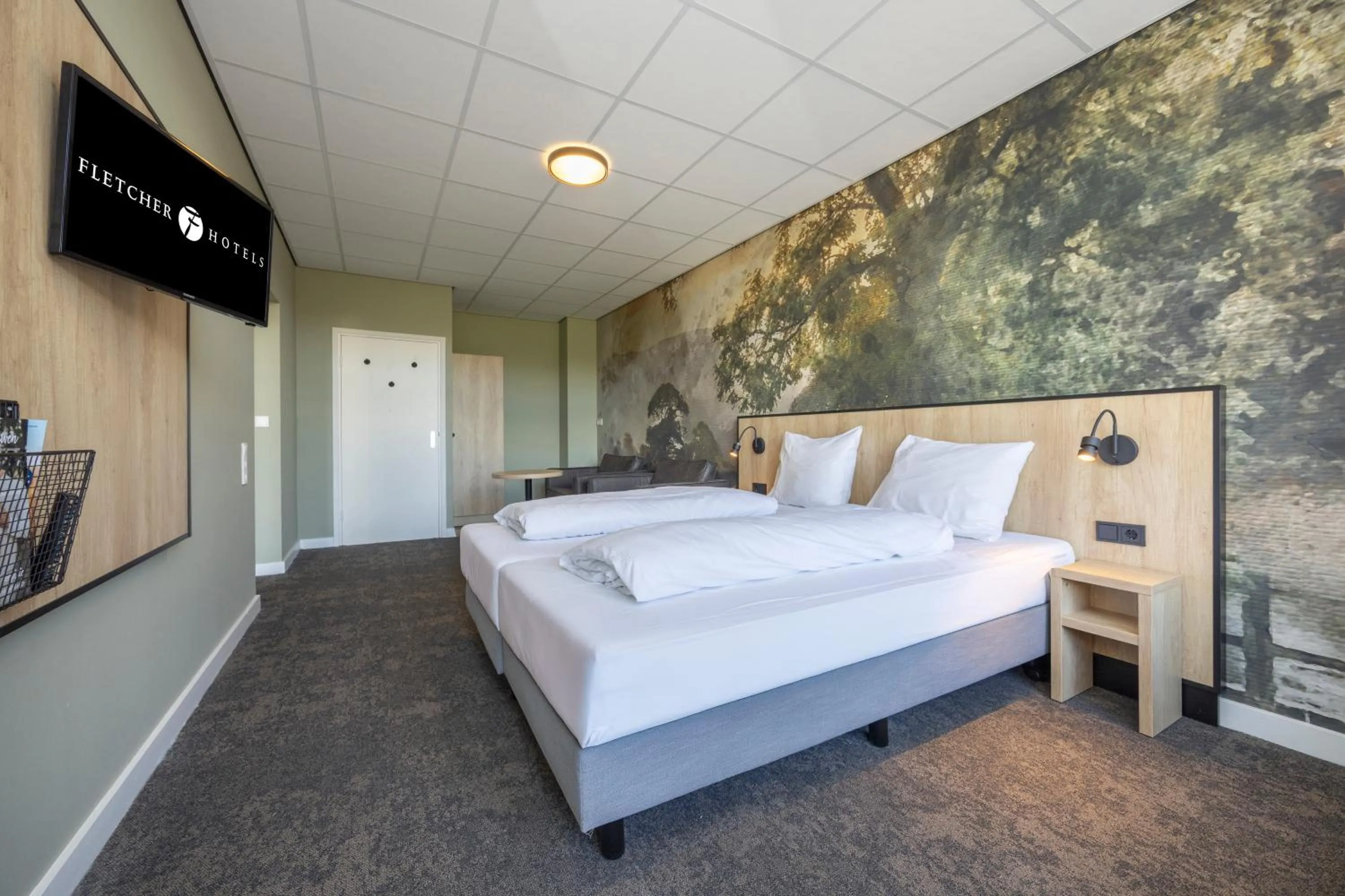 Bed in Fletcher Hotel Restaurant Bon Repos