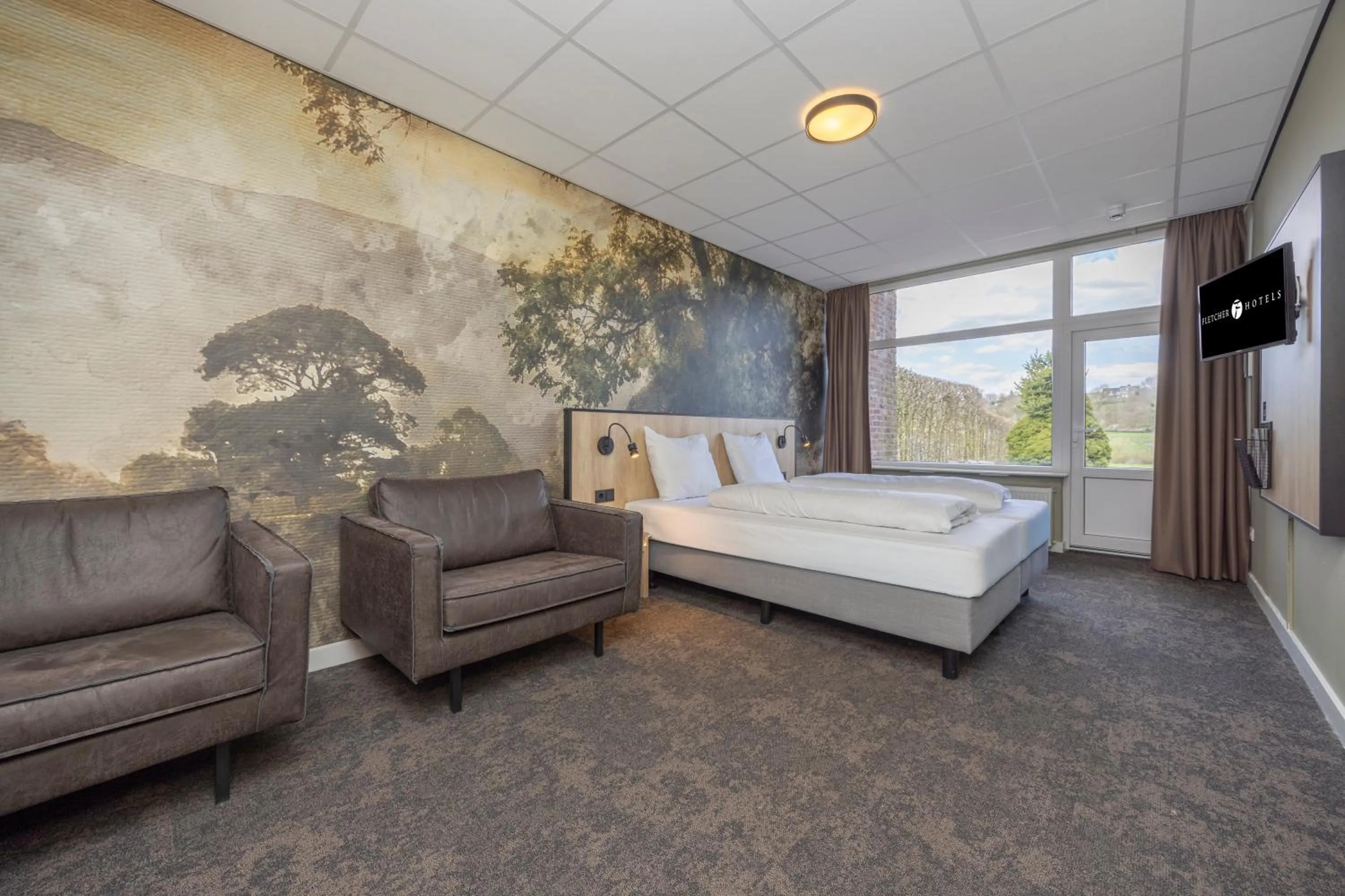 Photo of the whole room, Bed in Fletcher Hotel Restaurant Bon Repos