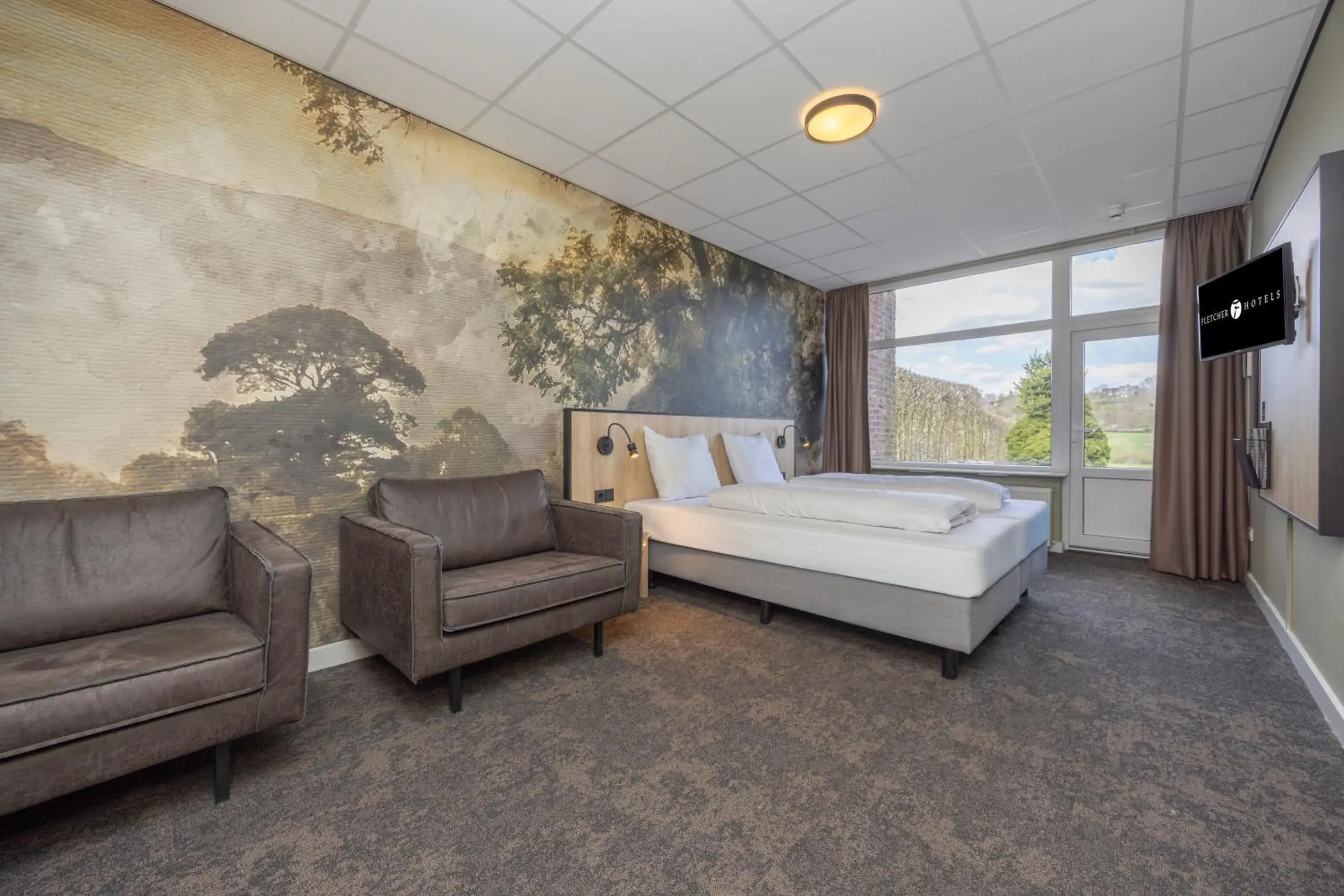 Photo of the whole room, Bed in Fletcher Hotel Restaurant Bon Repos Photo of the whole room, Bed in Fletcher Hotel Restaurant Bon Repos