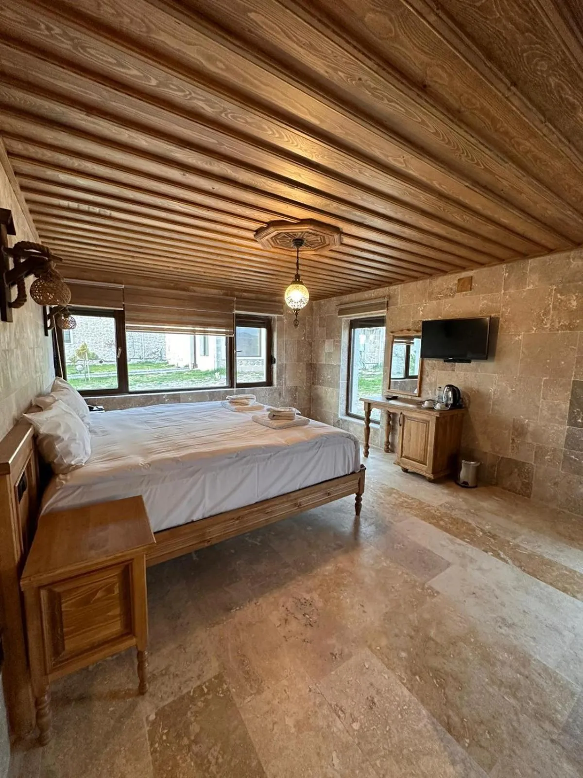 Bed in ELEVRES STONE HOUSE HOTEL