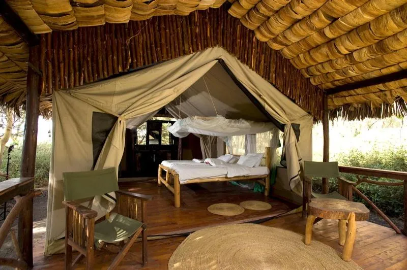 Bed in Migunga Tented Camp