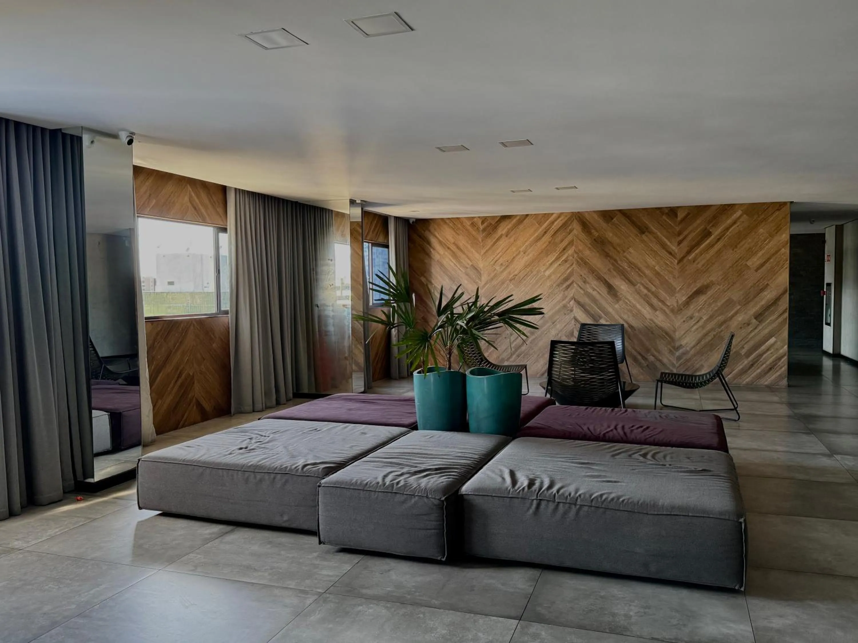 Seating area in EDF TIME - By Temporada Expert - Prédio com excelente custo benefício!