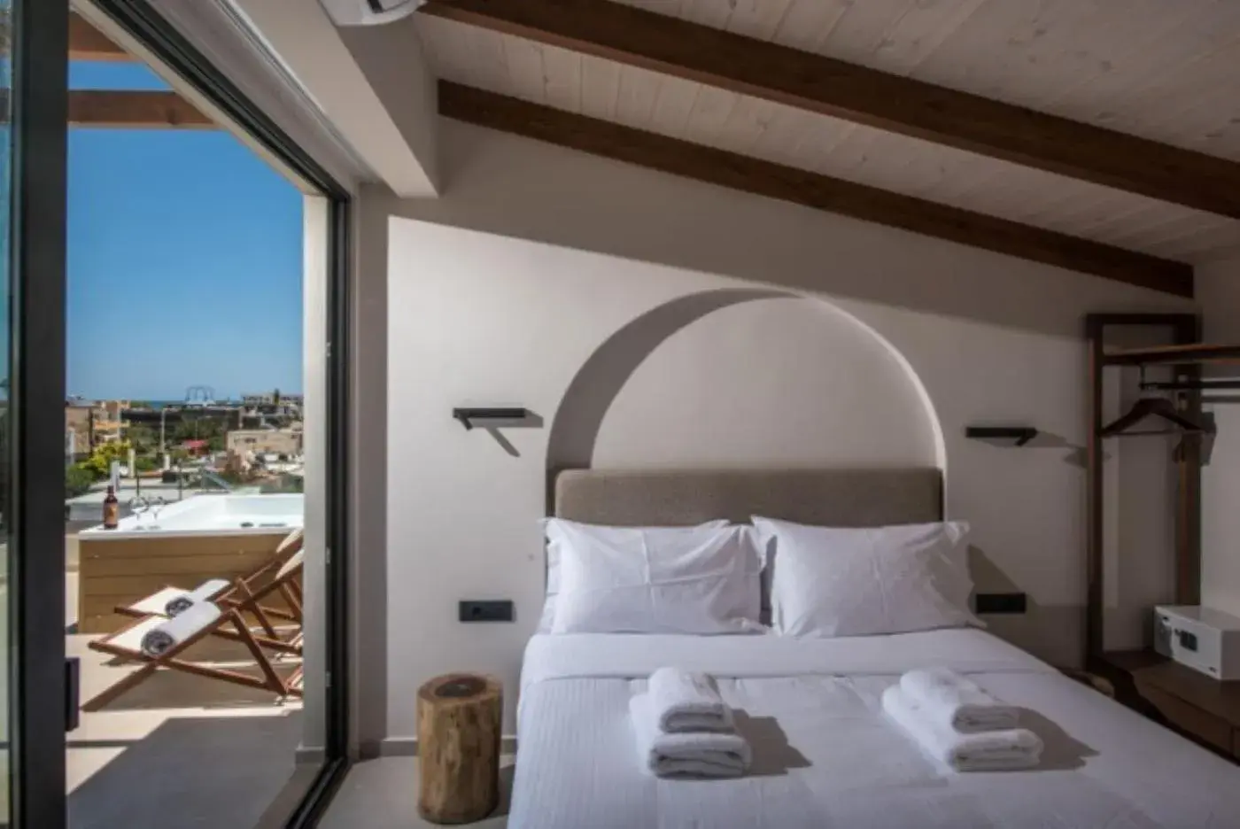 Patio, Bed in VAYA Suites by Omilos Hotels Patio, Bed in VAYA Suites by Omilos Hotels