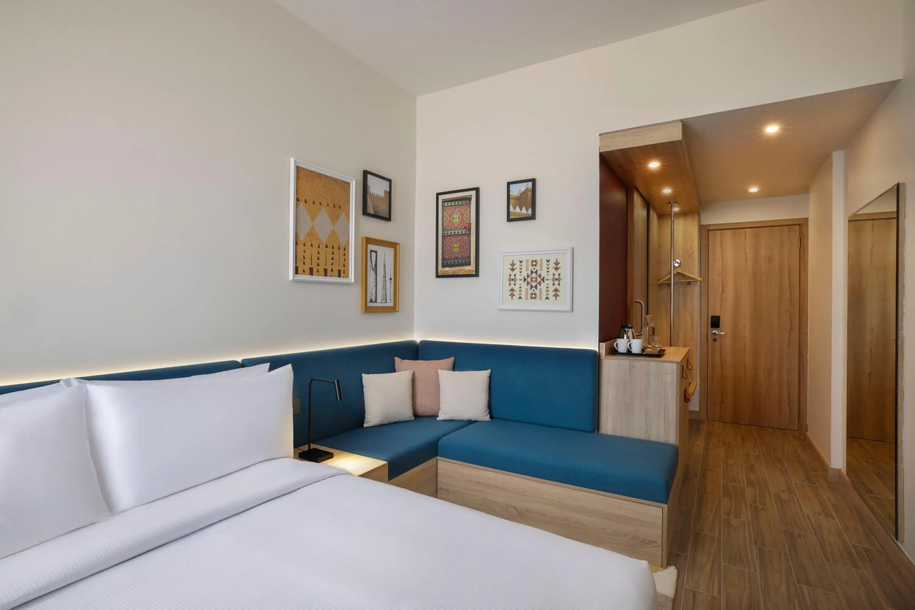 Photo of the whole room, Bed in Hampton by Hilton Sharma NEOM Community 1