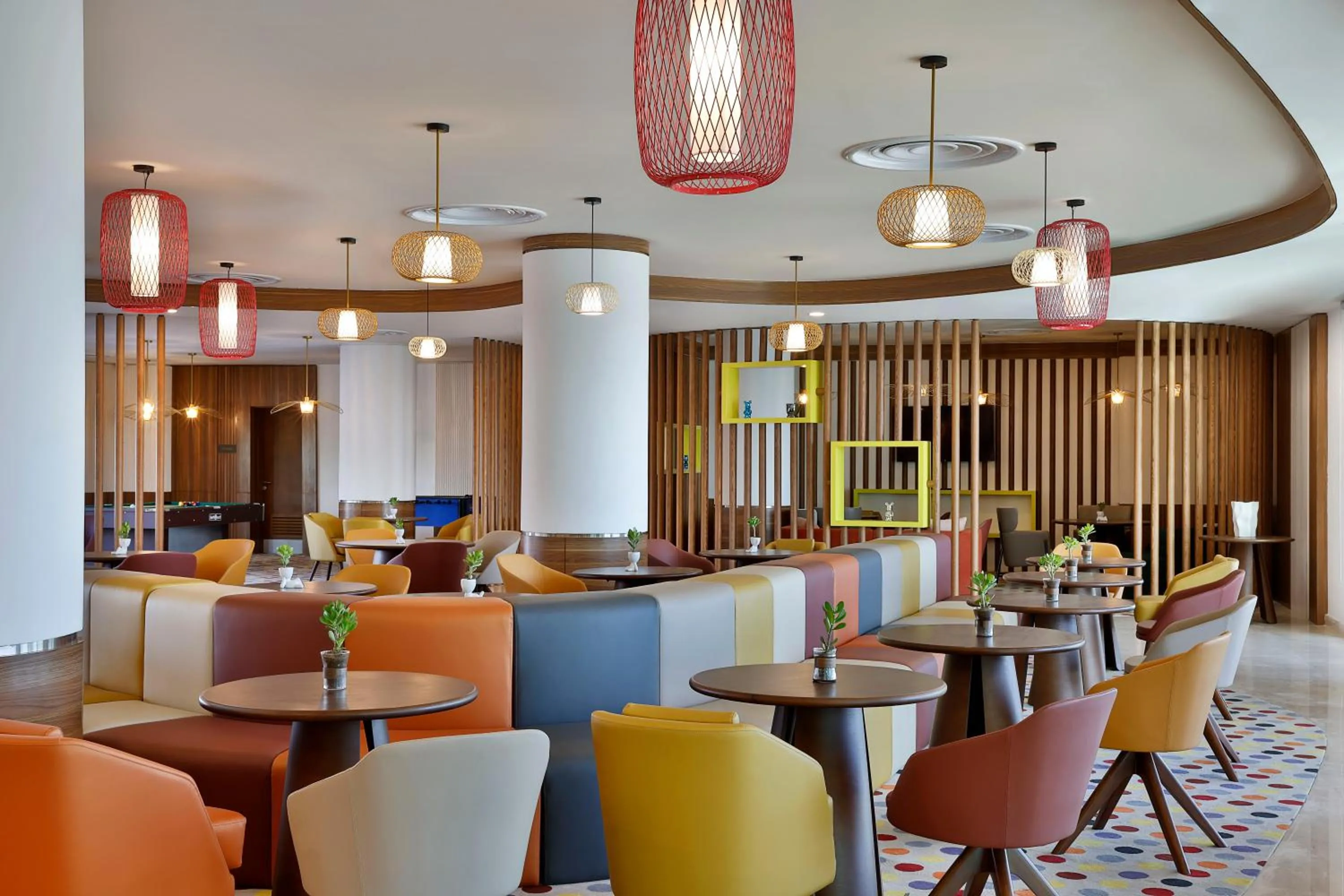 Seating area in Hampton by Hilton Sharma NEOM Community 1