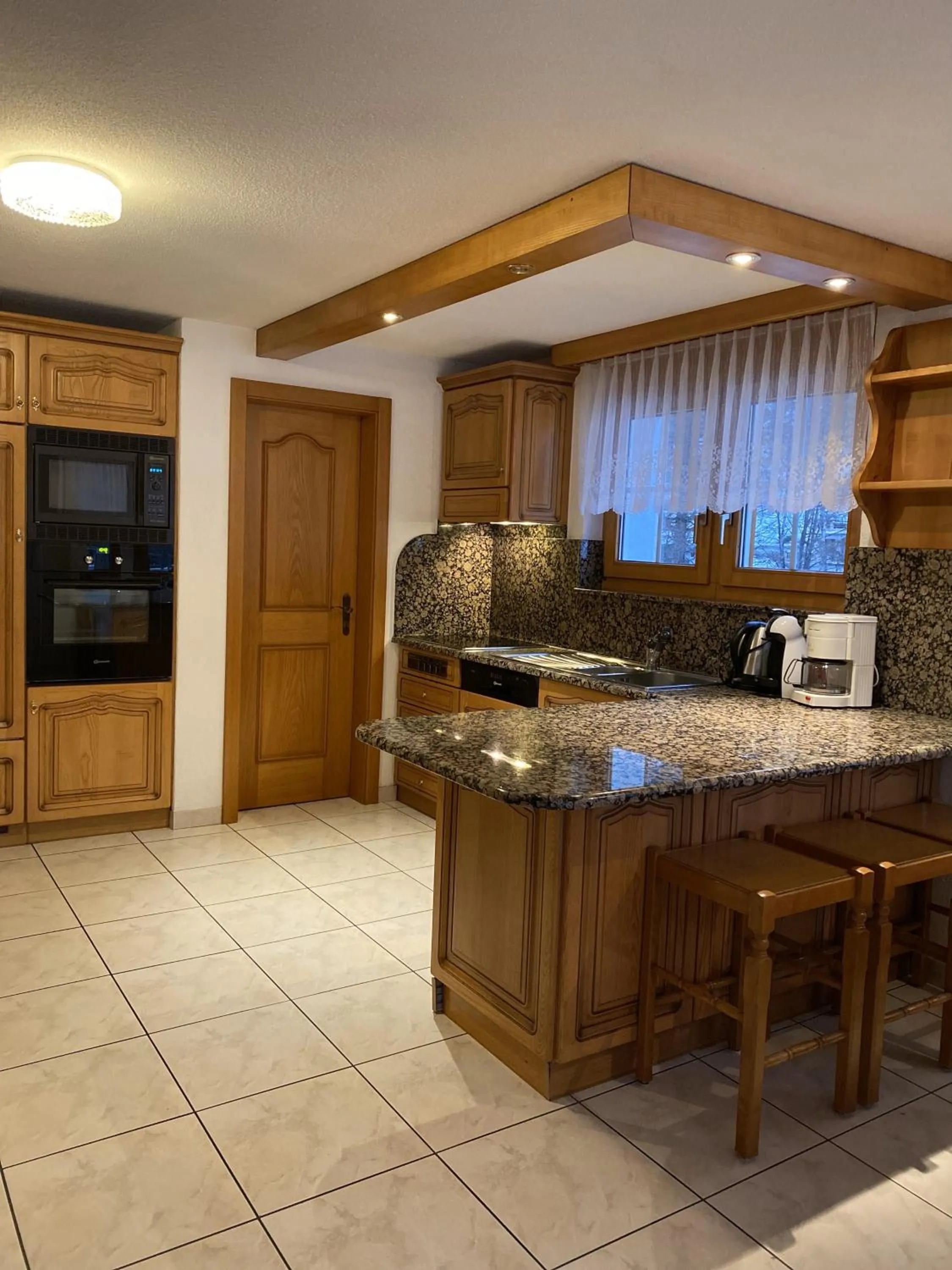 Kitchen or kitchenette in Apartments Arcadia