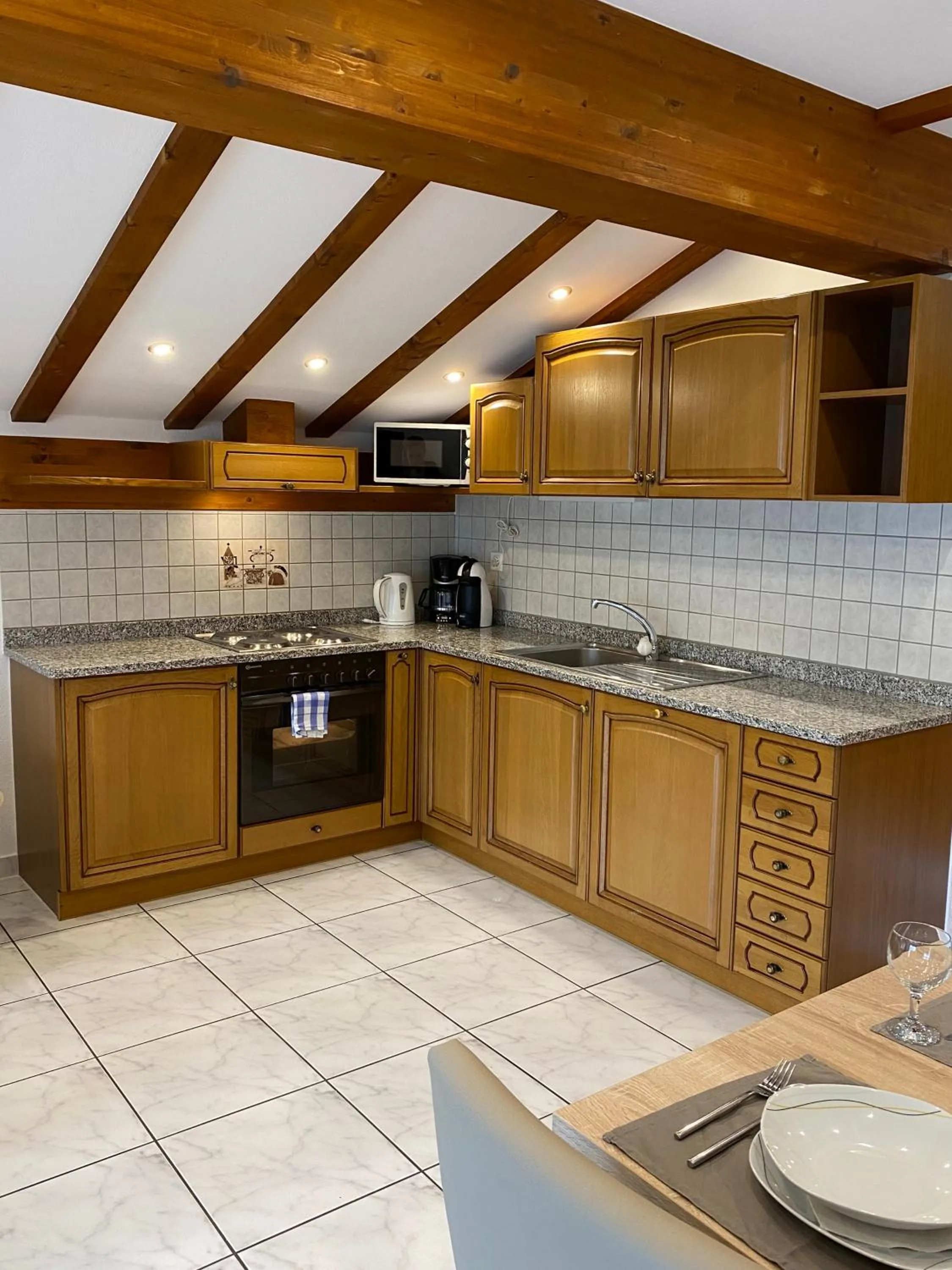 Kitchen or kitchenette in Apartments Arcadia