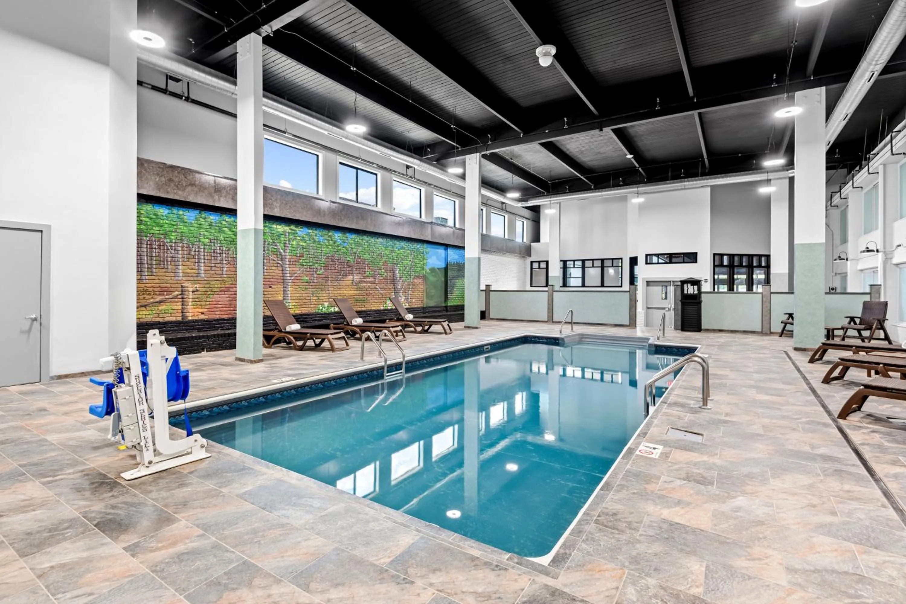 Swimming pool in HomeTowne Studios by Red Roof & Conference Center Cortland