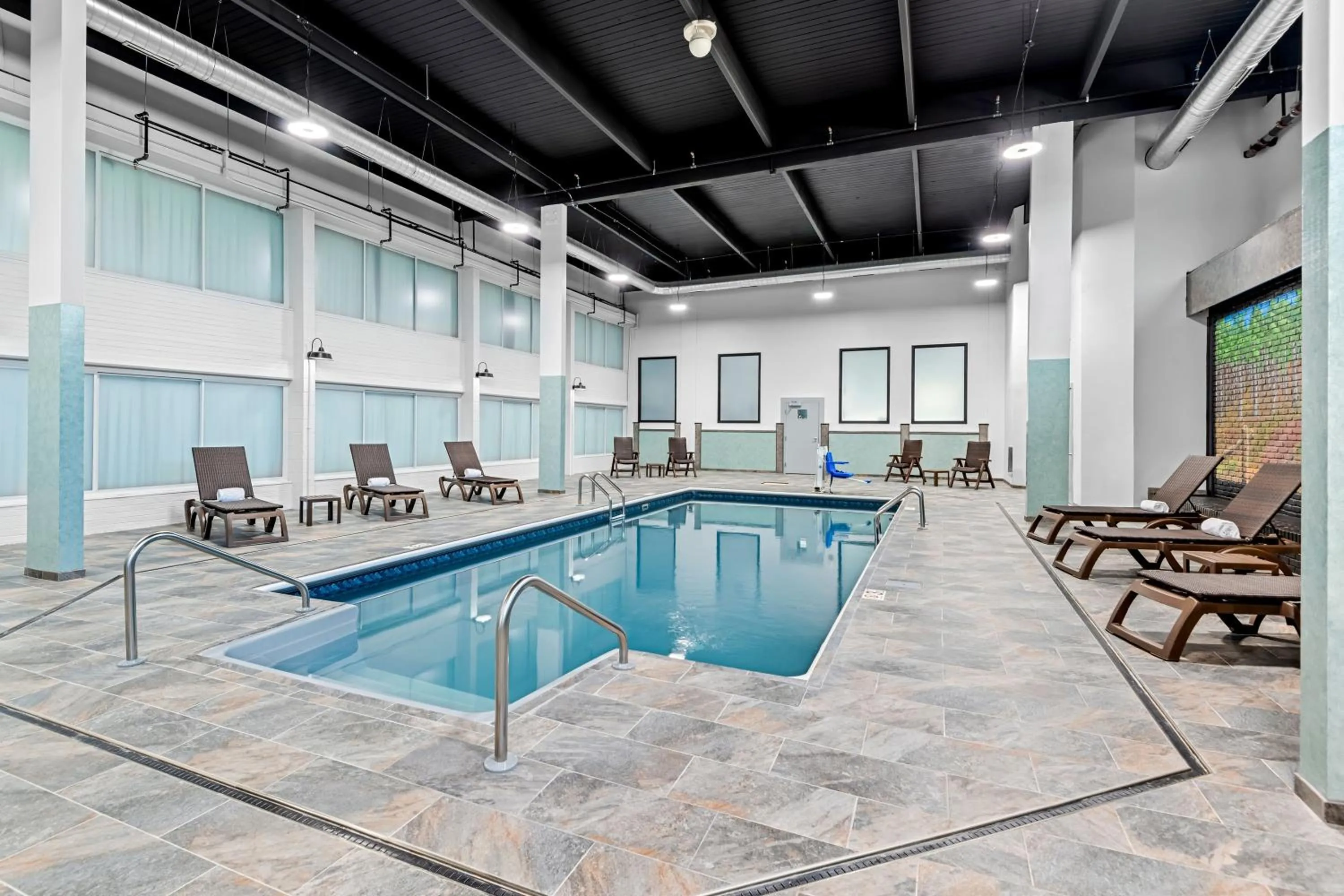 Swimming pool in HomeTowne Studios by Red Roof & Conference Center Cortland