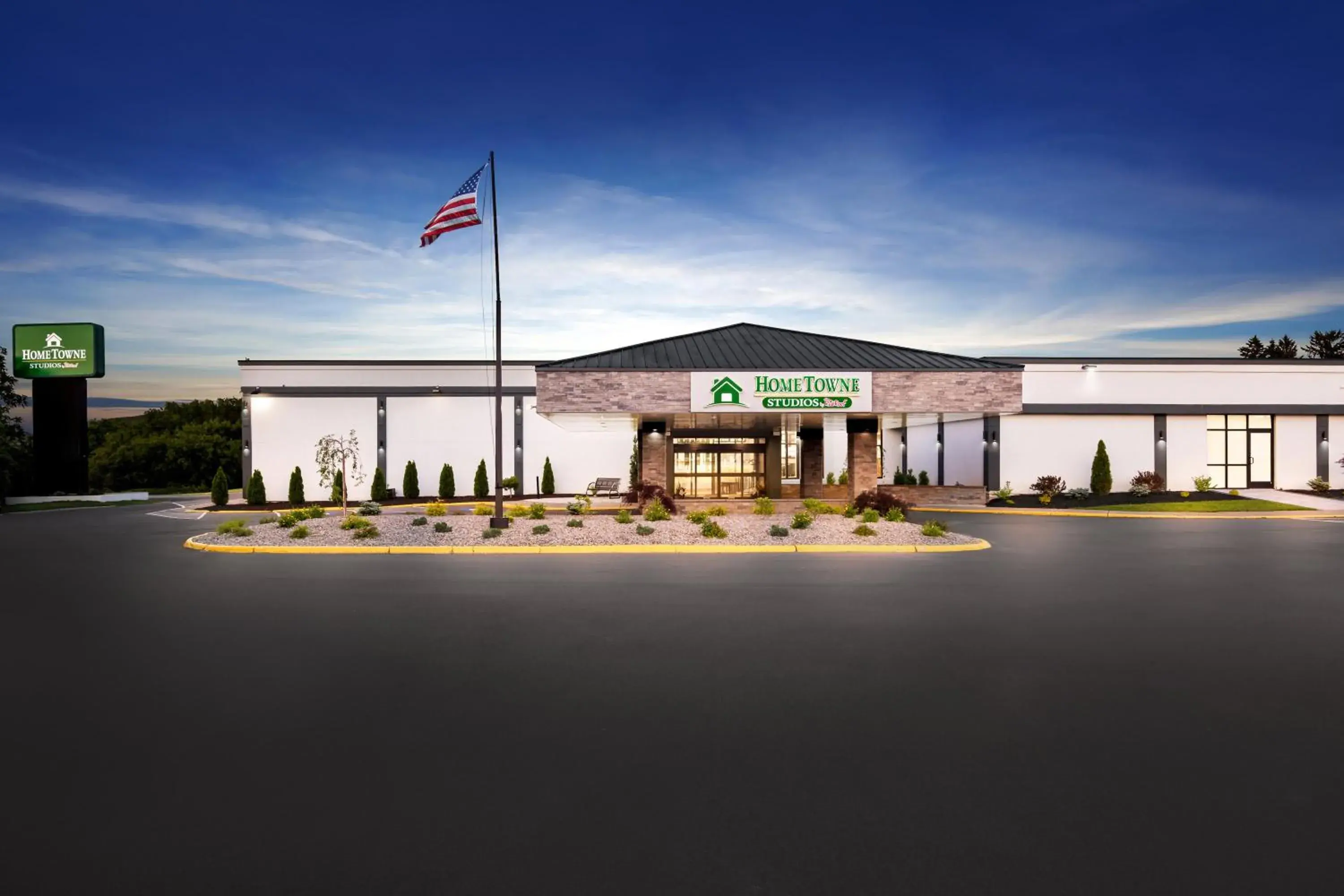 Property building in HomeTowne Studios by Red Roof & Conference Center Cortland Property building in HomeTowne Studios by Red Roof & Conference Center Cortland