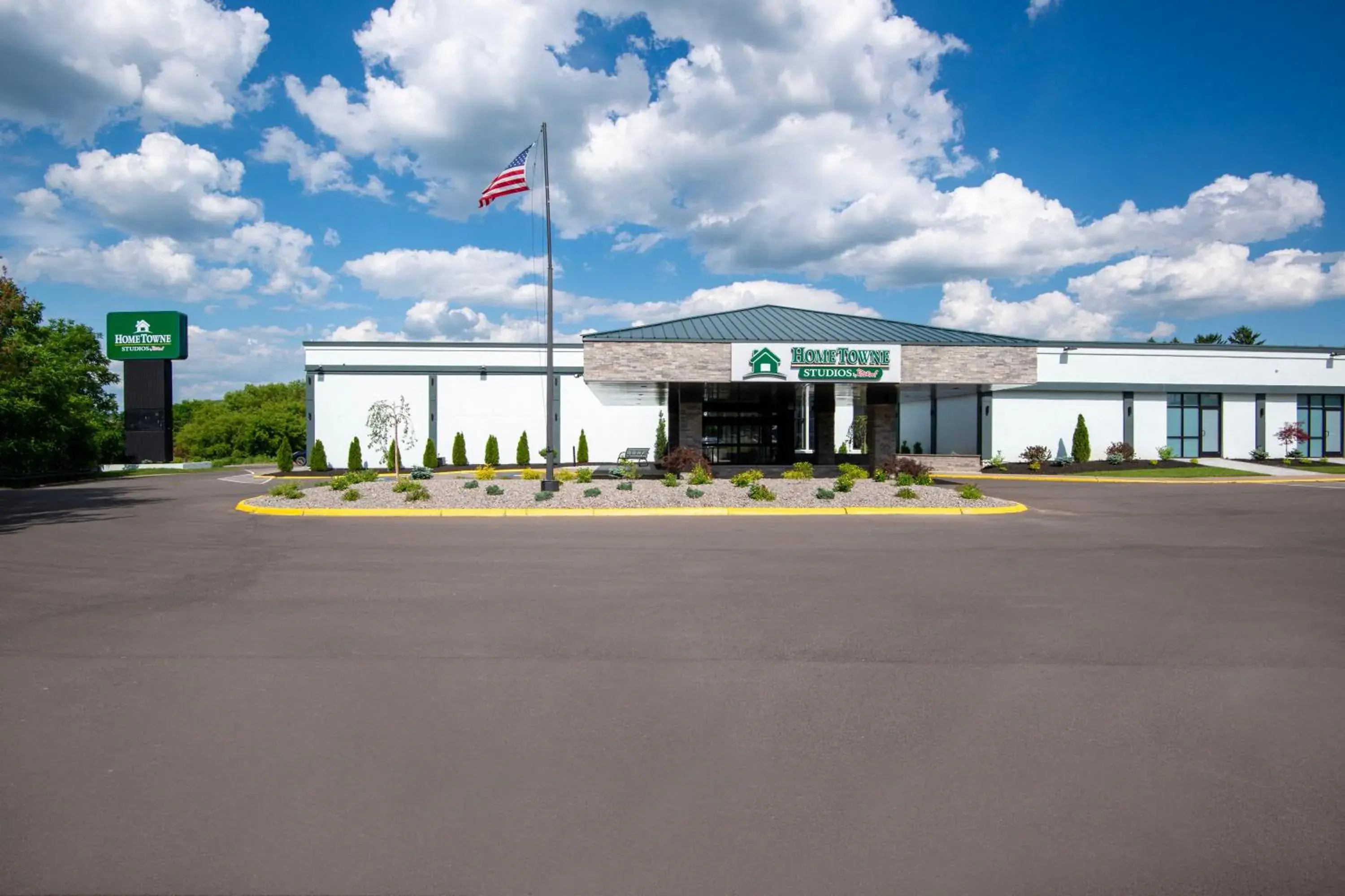 Property building in HomeTowne Studios by Red Roof & Conference Center Cortland Property building in HomeTowne Studios by Red Roof & Conference Center Cortland