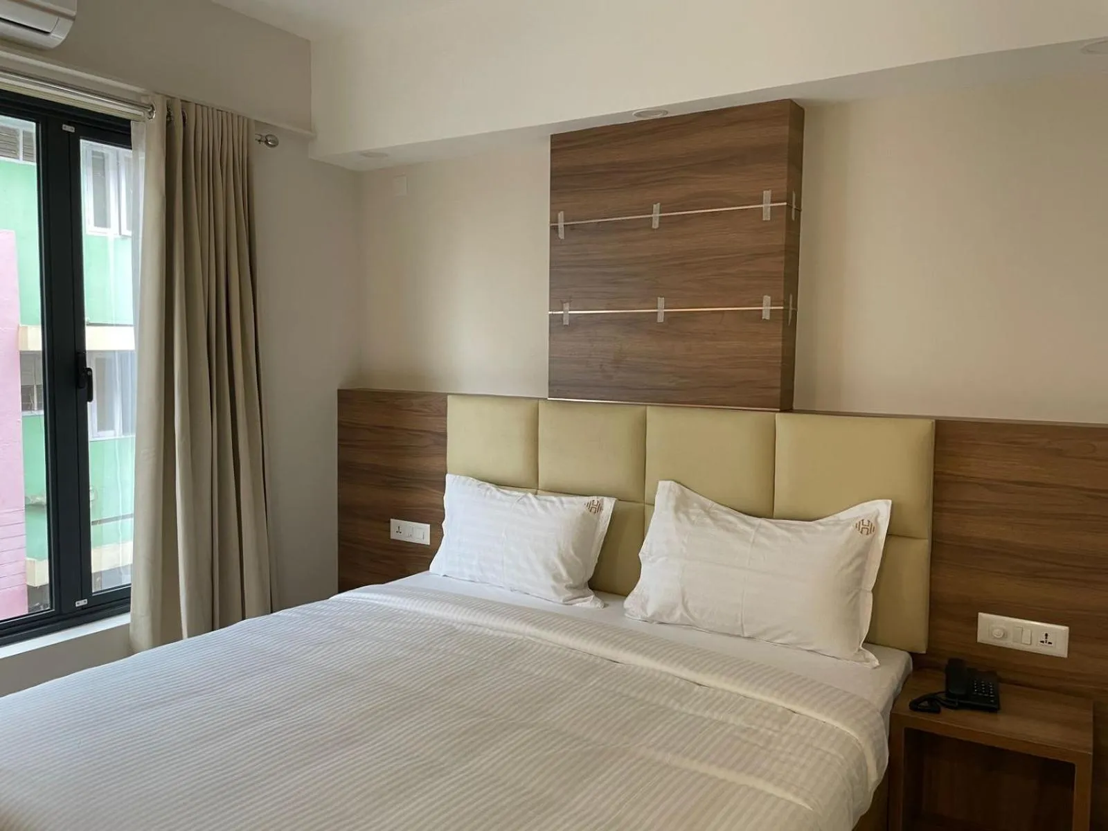 Bed in The Heartland Business Hotel