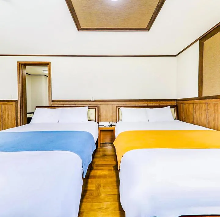 Bed in Jeju B Hotel