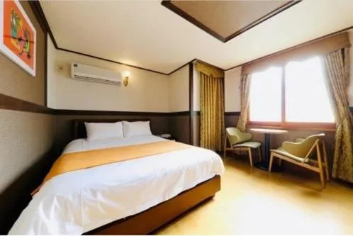 Bed in Jeju B Hotel