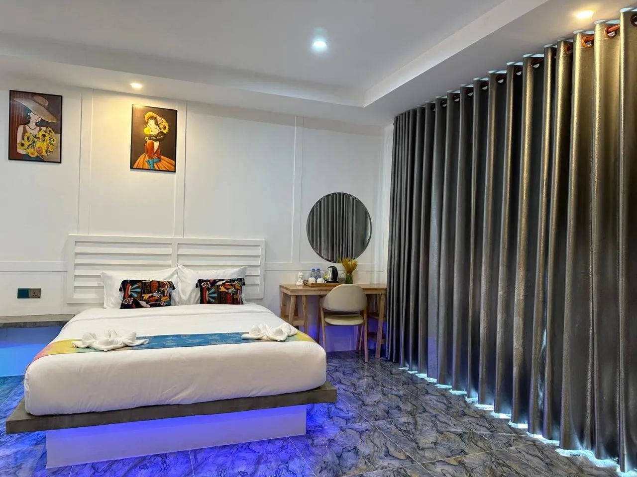Bed in SEA SAND RESORT