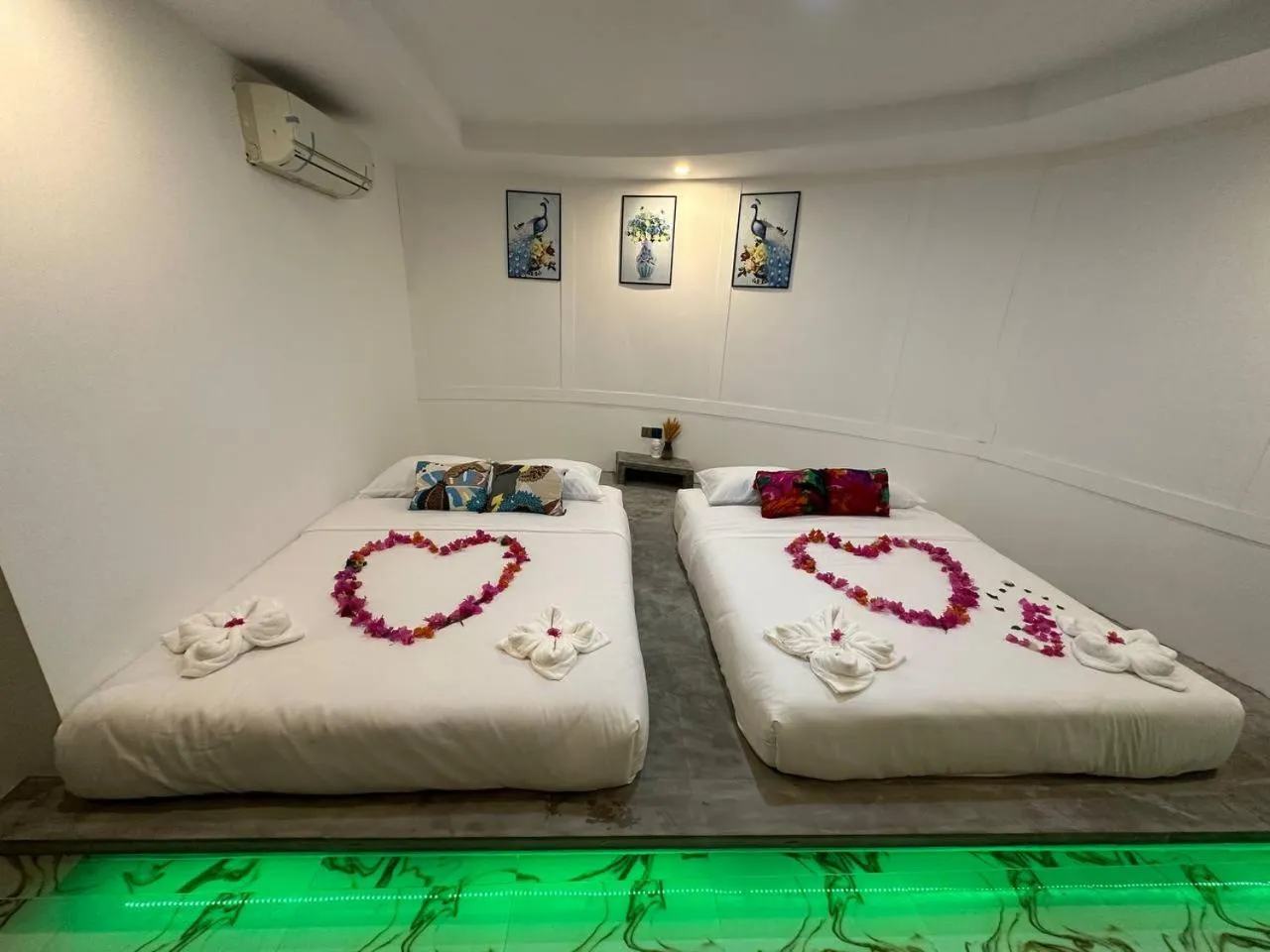 Bed in SEA SAND RESORT