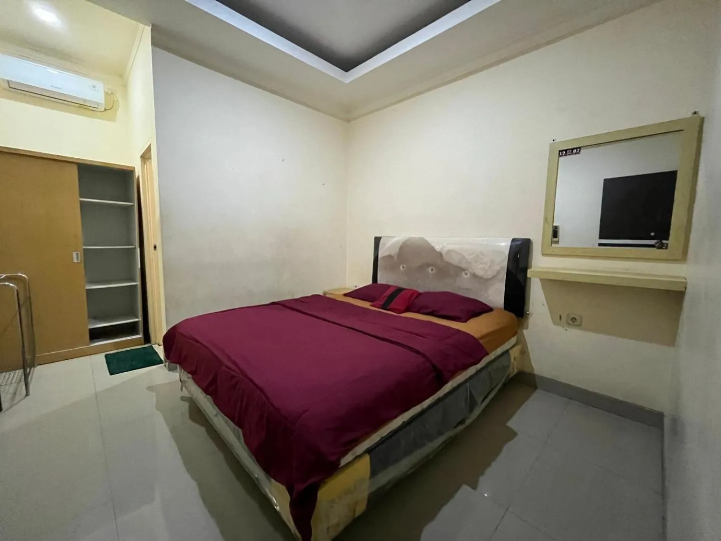 Bedroom, Bed in Omah Belimbing near ABM Malang Mitra RedDoorz