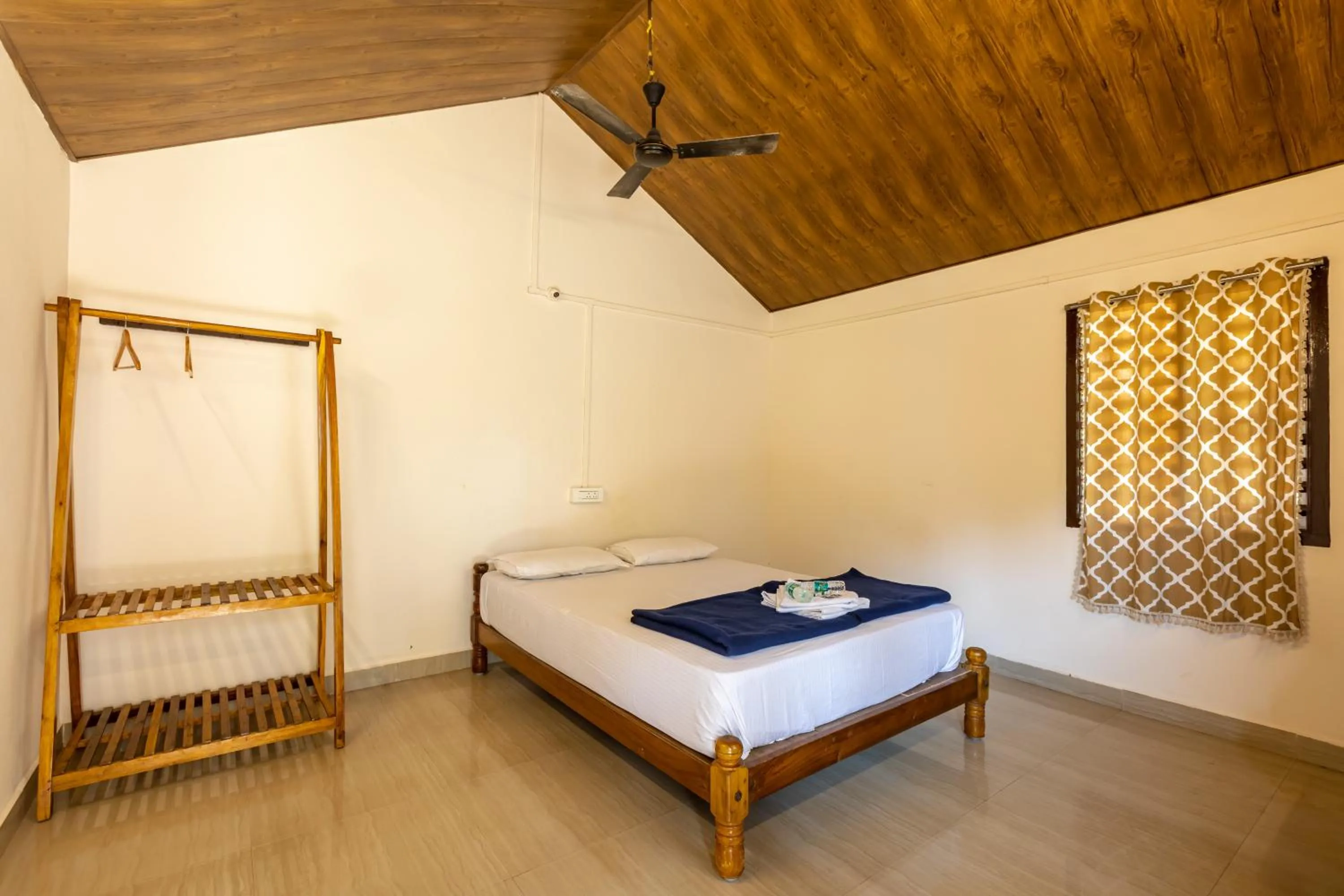 Bed in Sunset Cafe Beach Stay