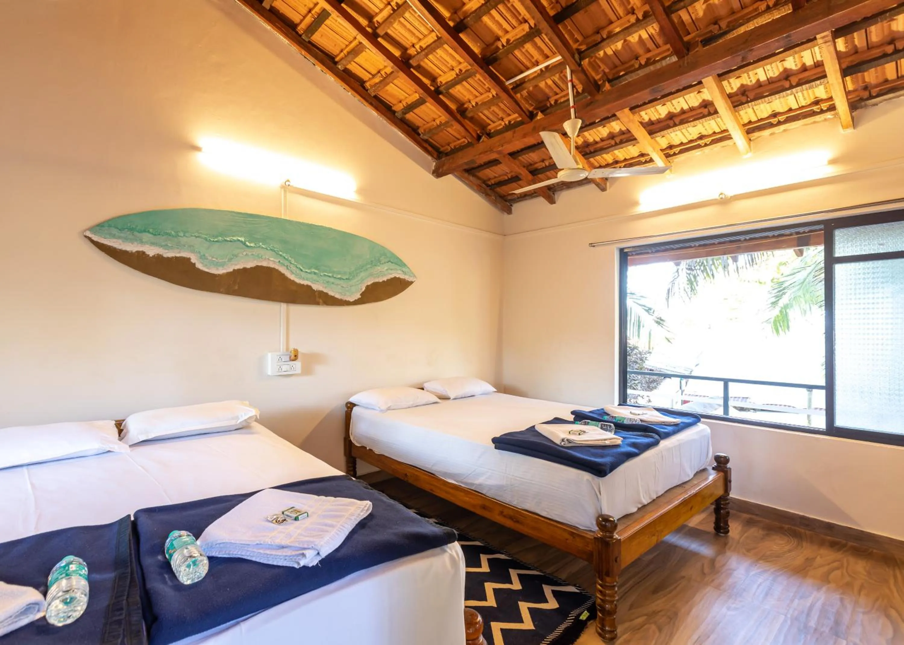 Bed in Sunset Cafe Beach Stay