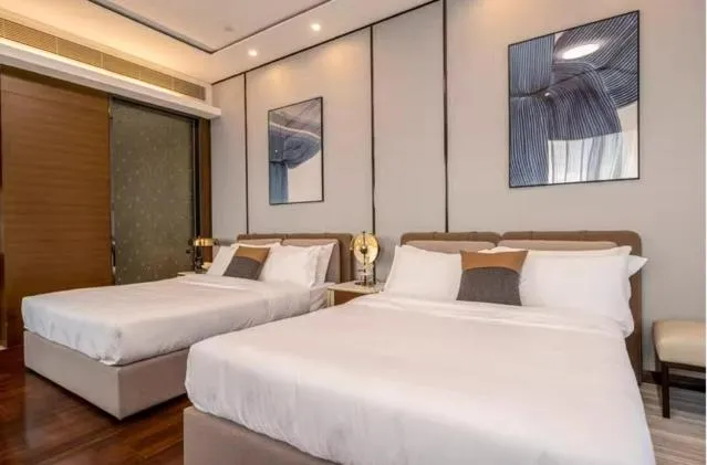 Bed in Millenia Executive Apartment Guangzhou East Railway Station