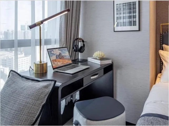 Photo of the whole room, Bed in Millenia Executive Apartment Guangzhou East Railway Station