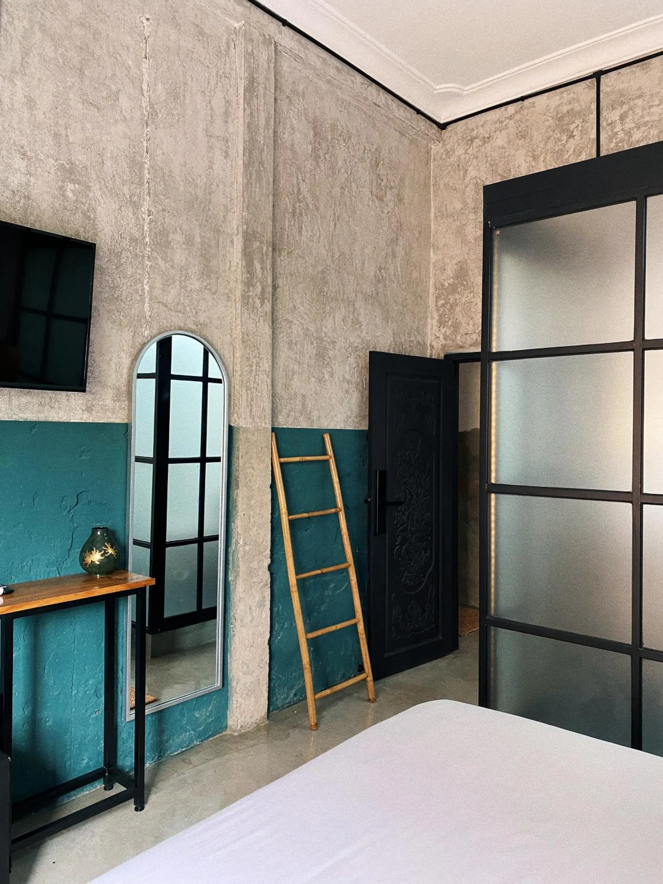 Bed in Sundays Boutique Eco Hotel