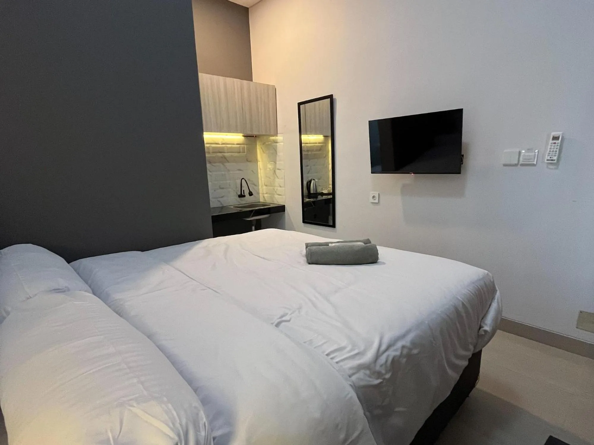 Bed in Kaira Room Guest House Syariah Mitra RedDoorz