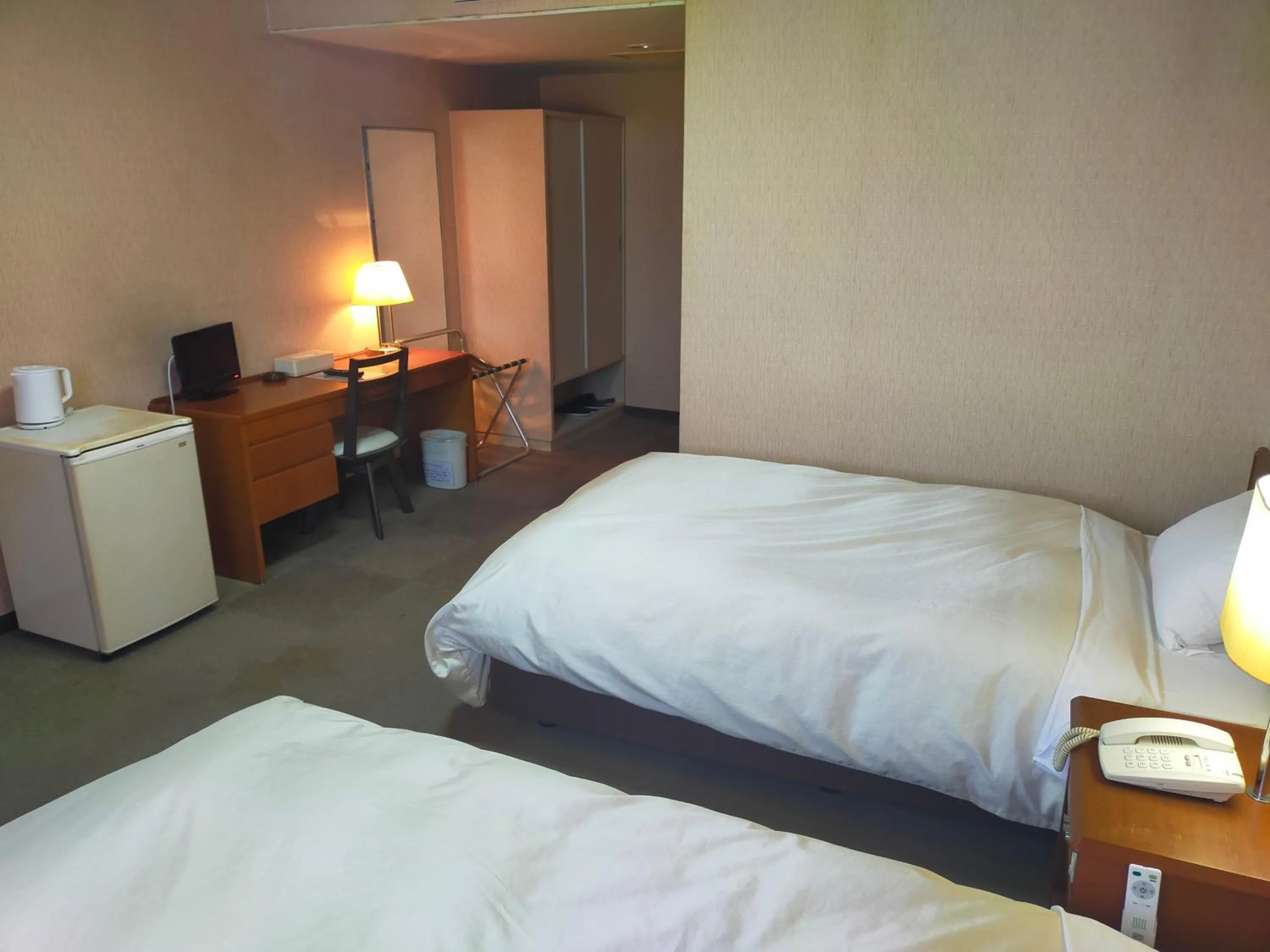 Bed in Hotel Kurashiki Mizushima Hills