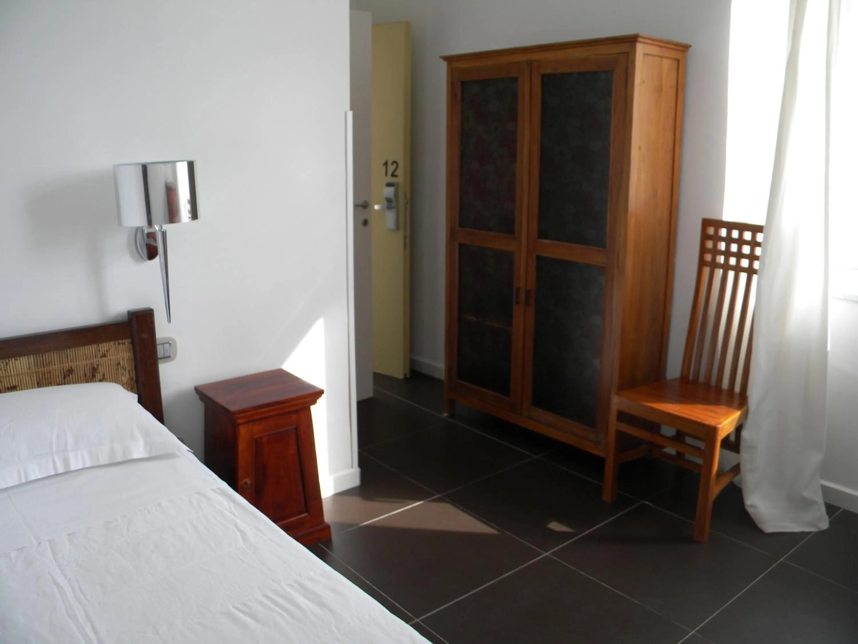 Photo of the whole room, Bed in HOTEL GENOVA