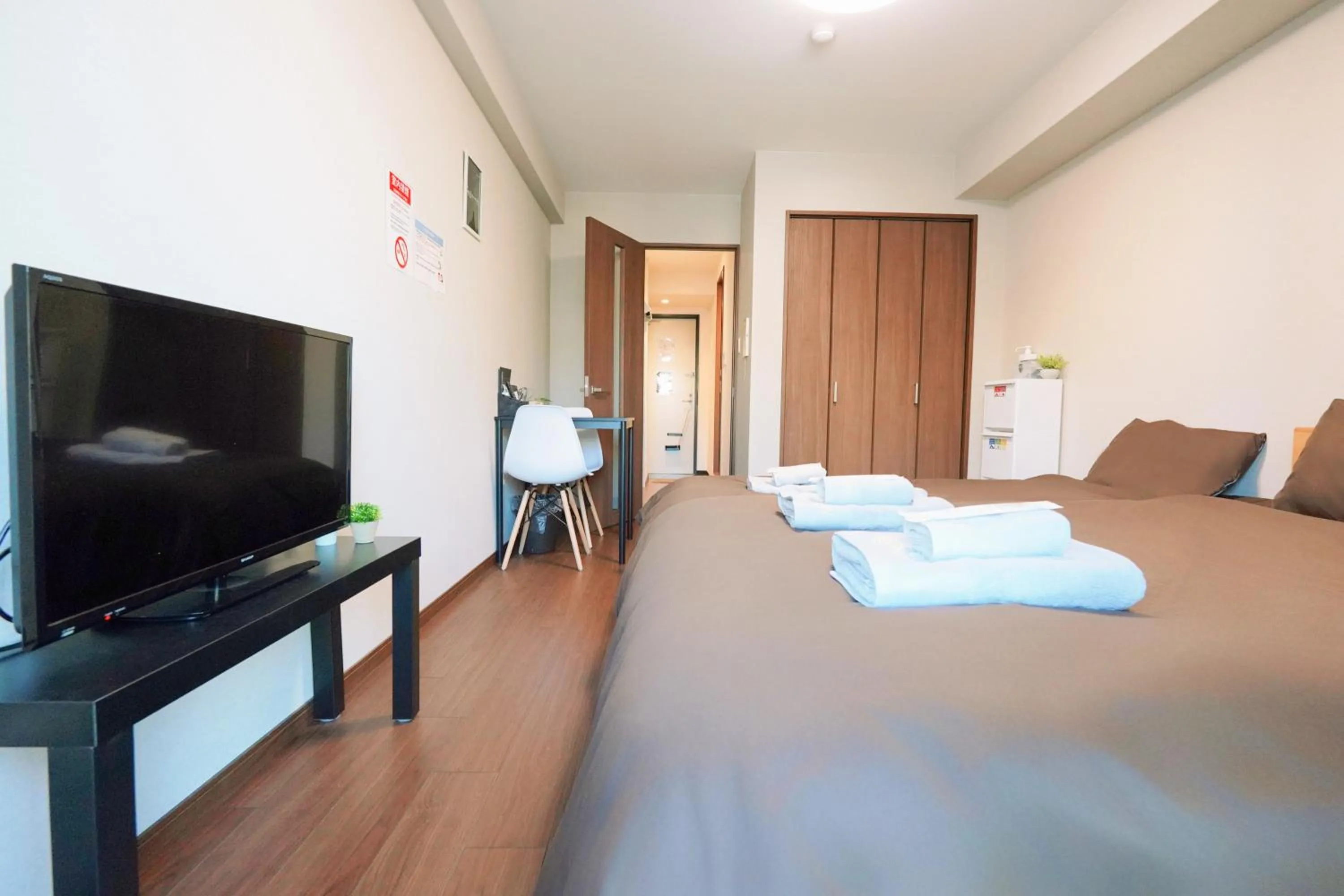 Bed in nestay apartment osaka ebisu