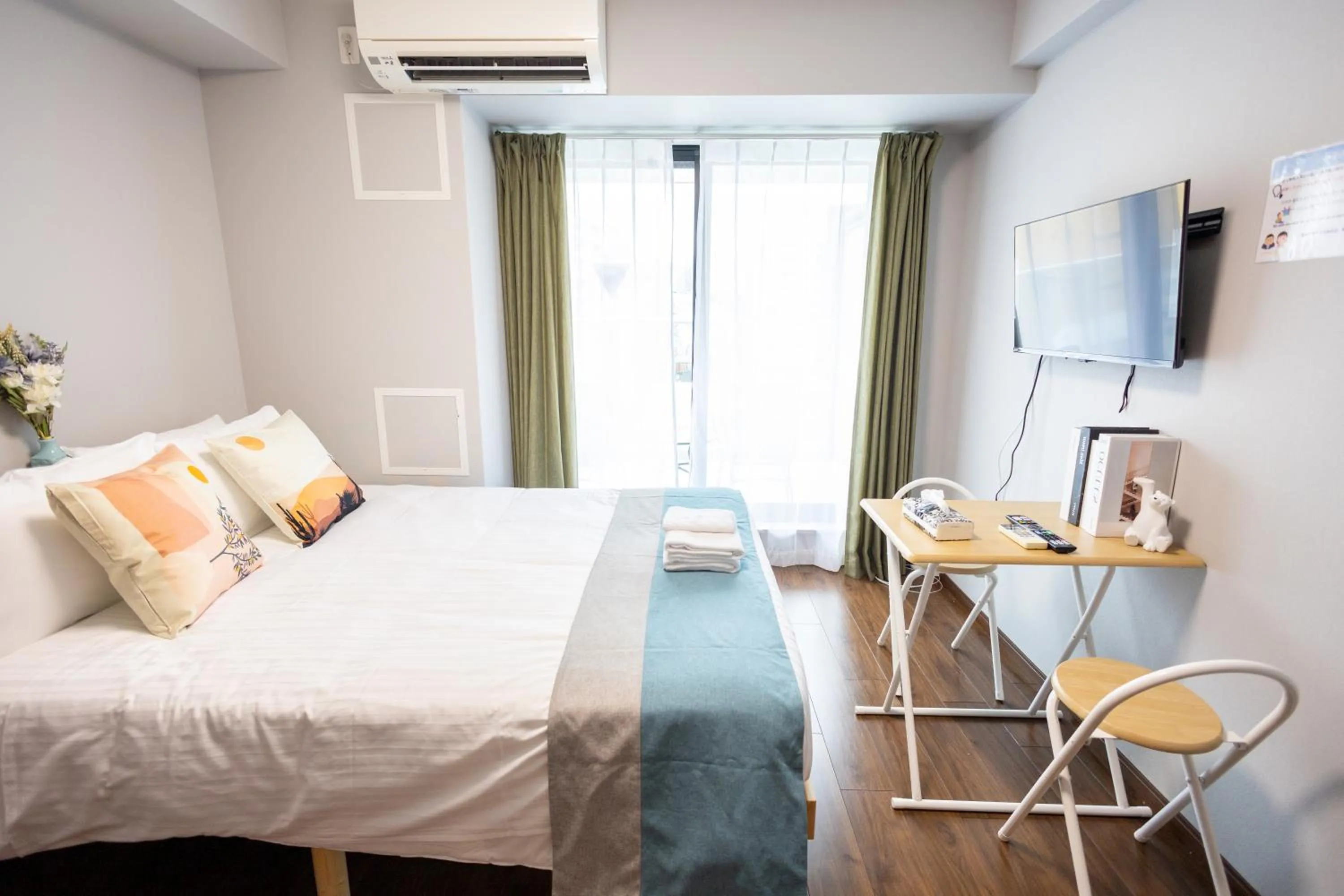 Bed in nestay apartment osaka ebisu