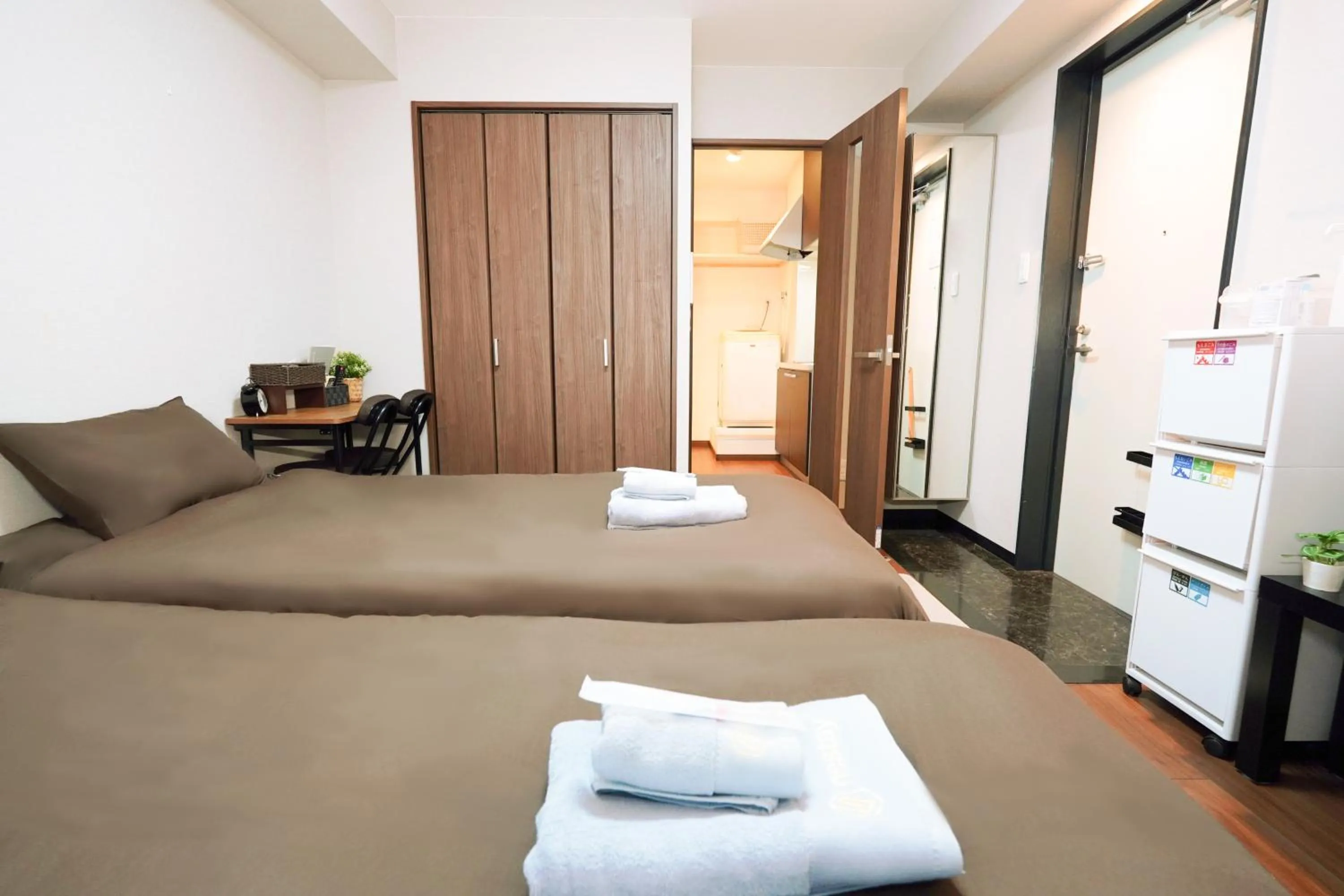 Bed in nestay apartment osaka ebisu