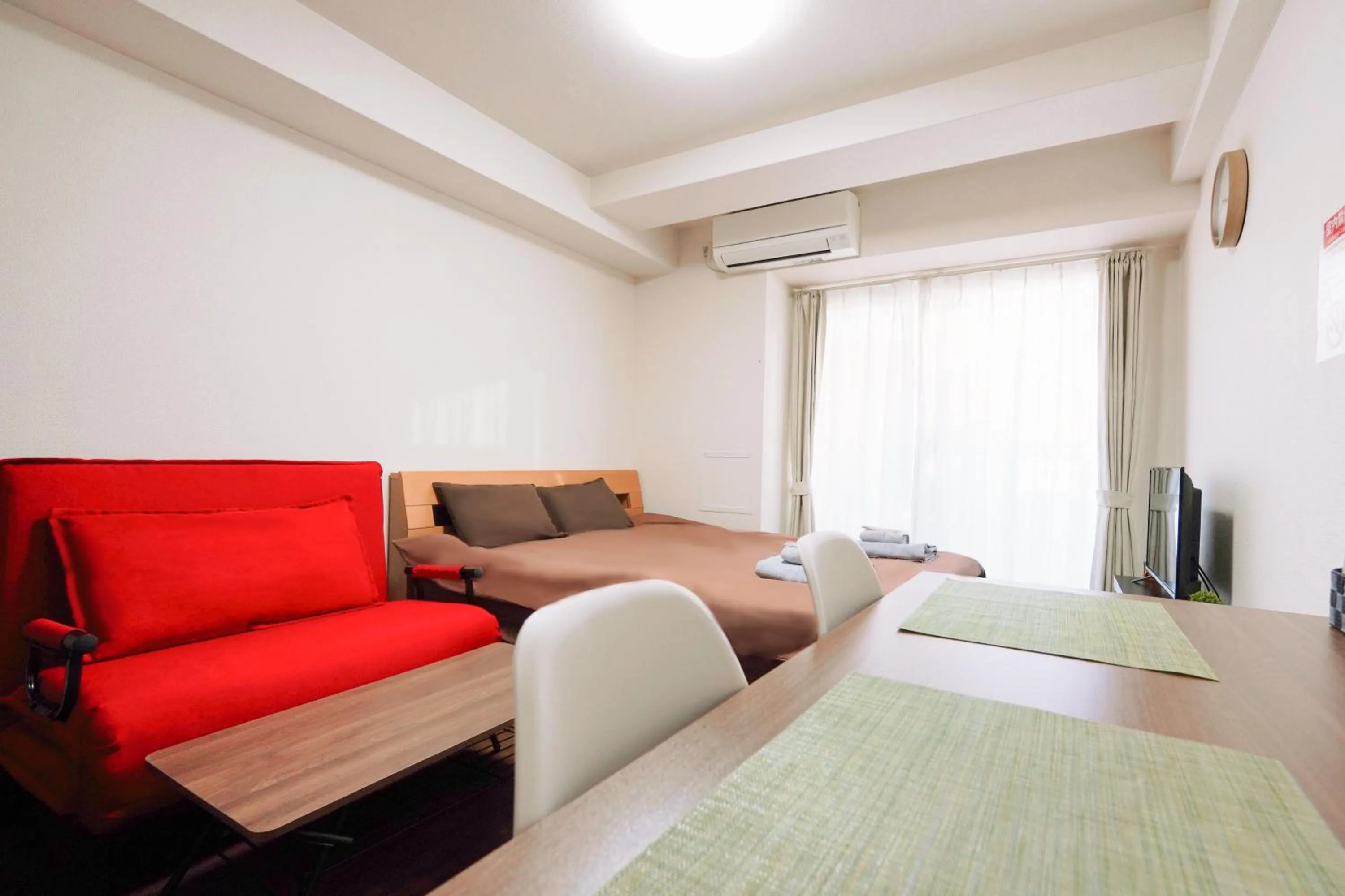 Bed in nestay apartment osaka ebisu