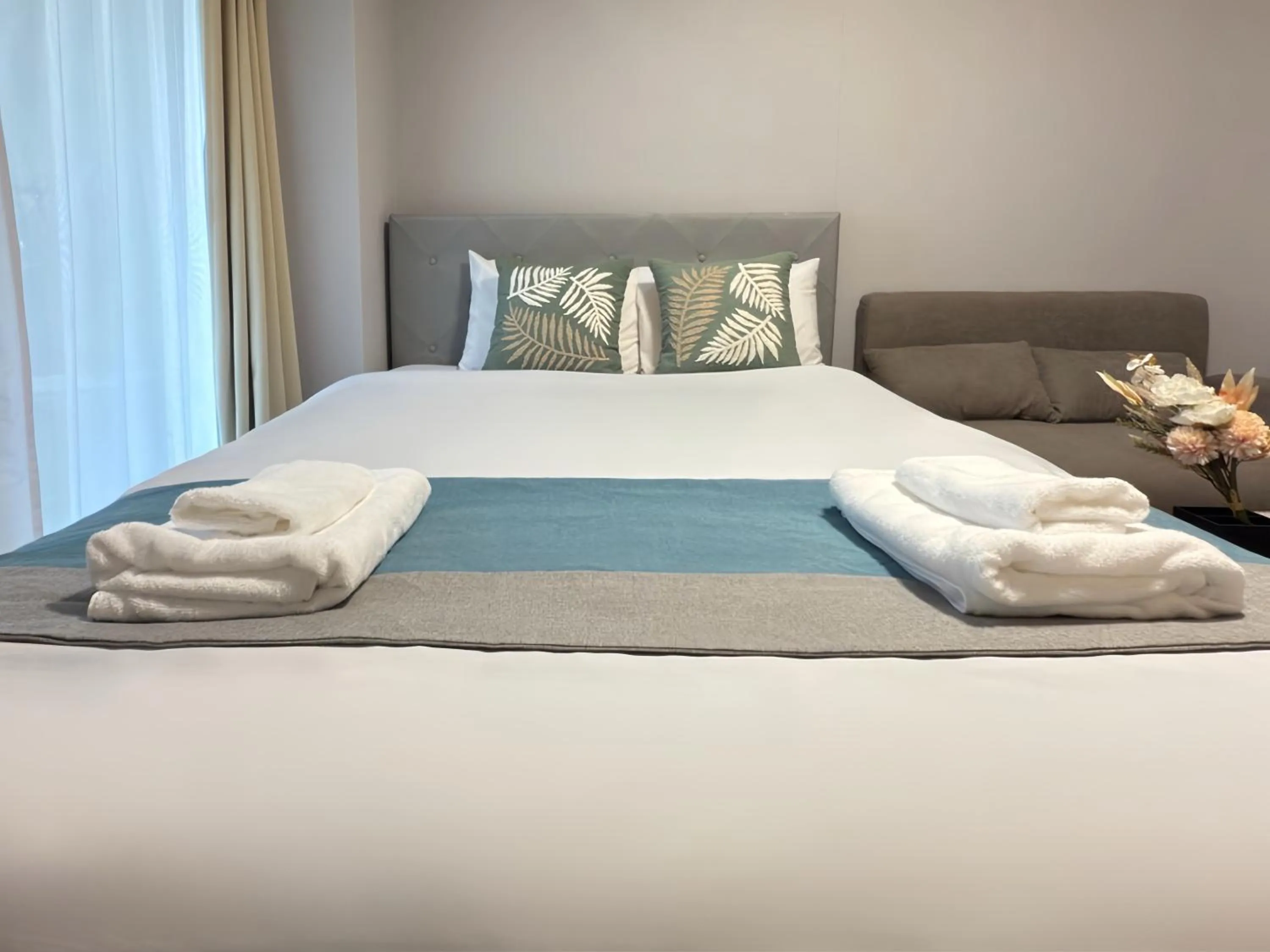 Bed in nestay apartment osaka ebisu