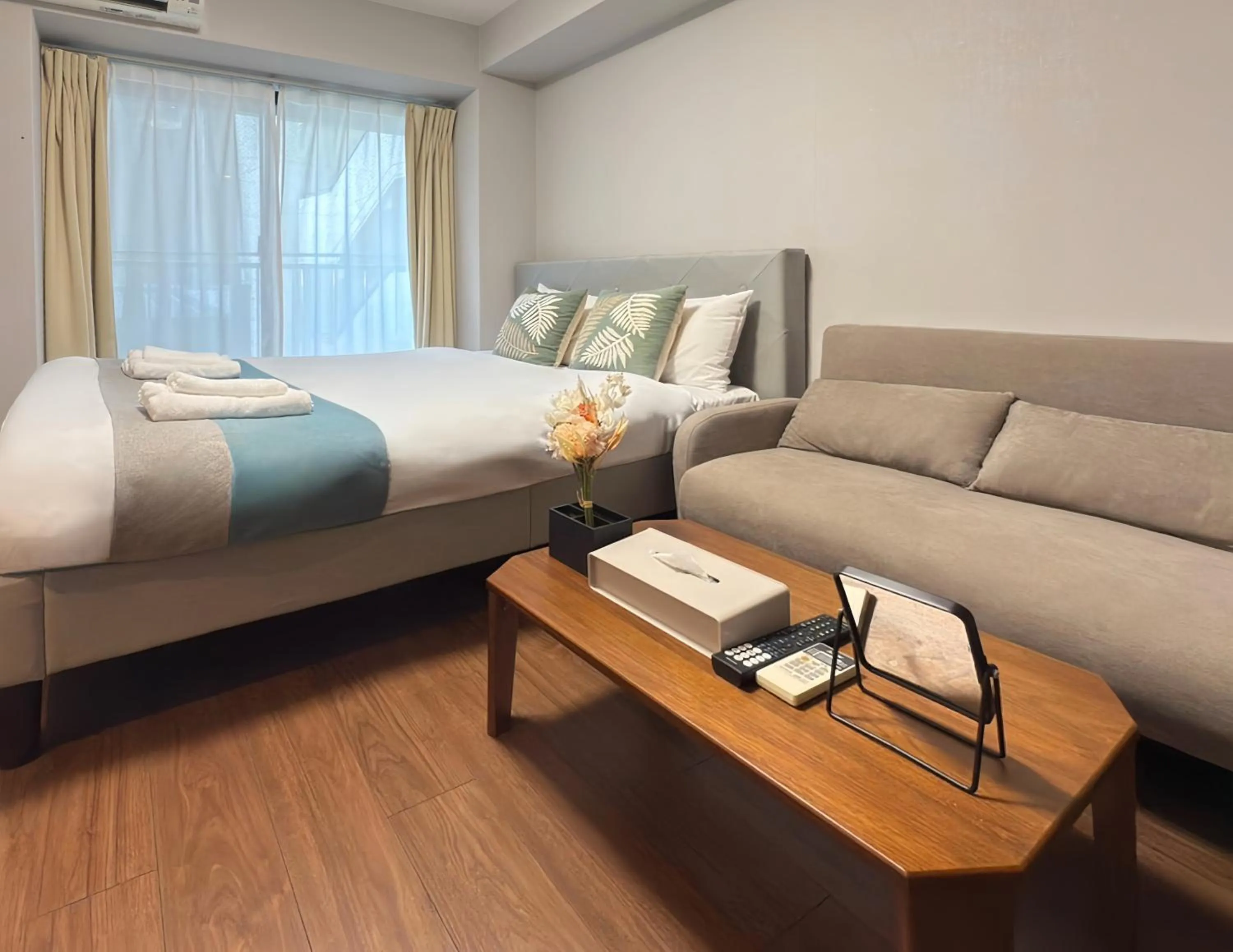 Bed in nestay apartment osaka ebisu