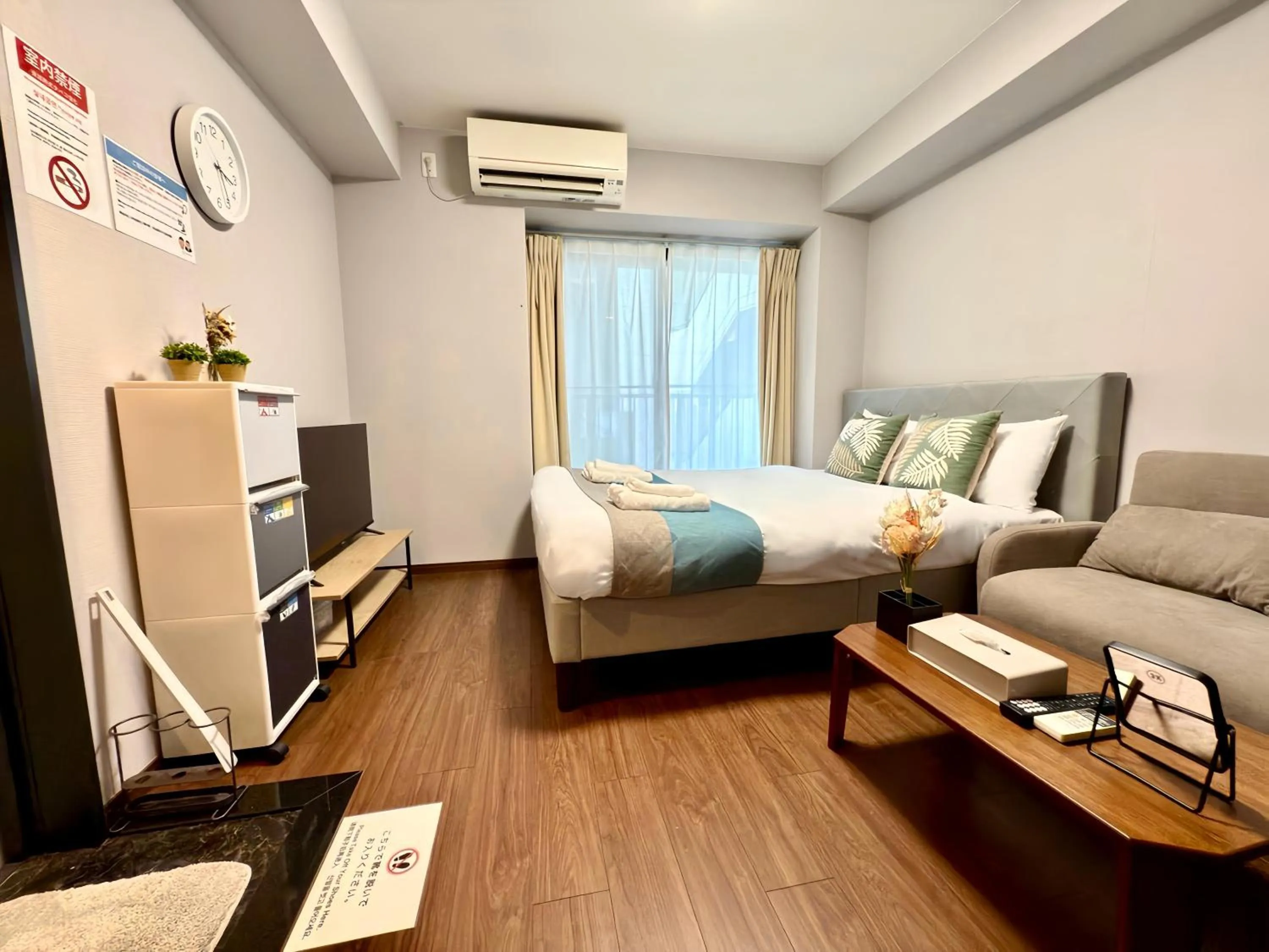 Bed in nestay apartment osaka ebisu