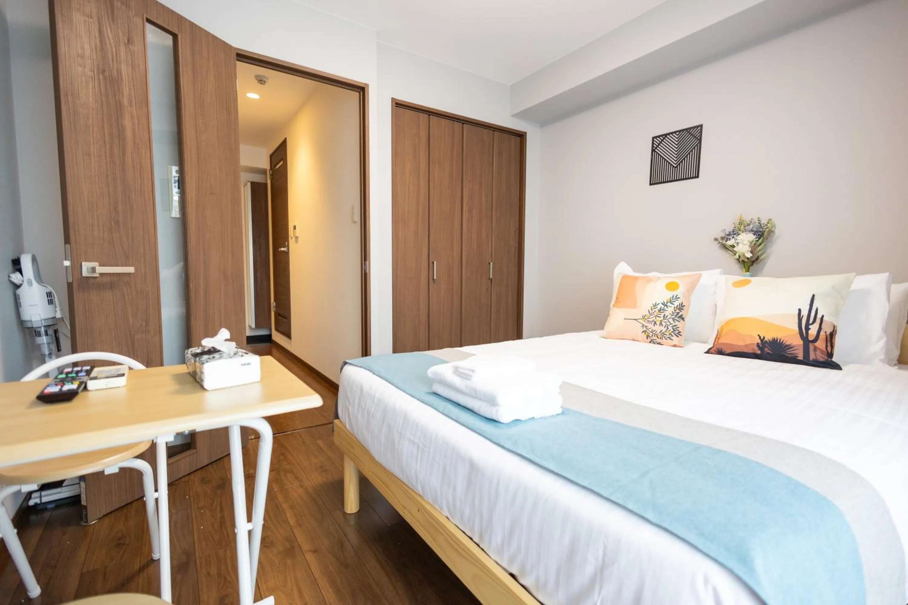 Bed in nestay apartment osaka ebisu