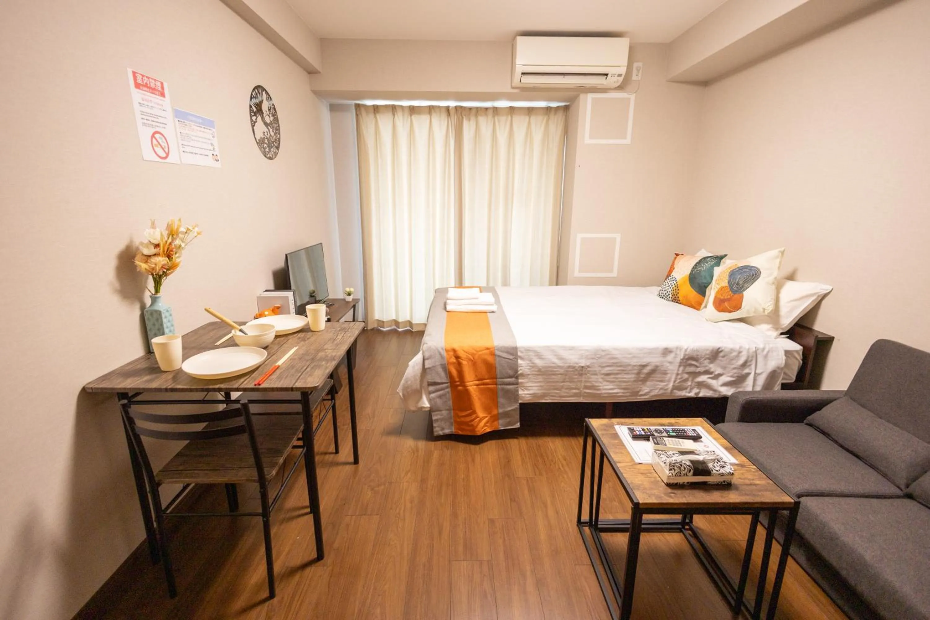 Bed in nestay apartment osaka ebisu