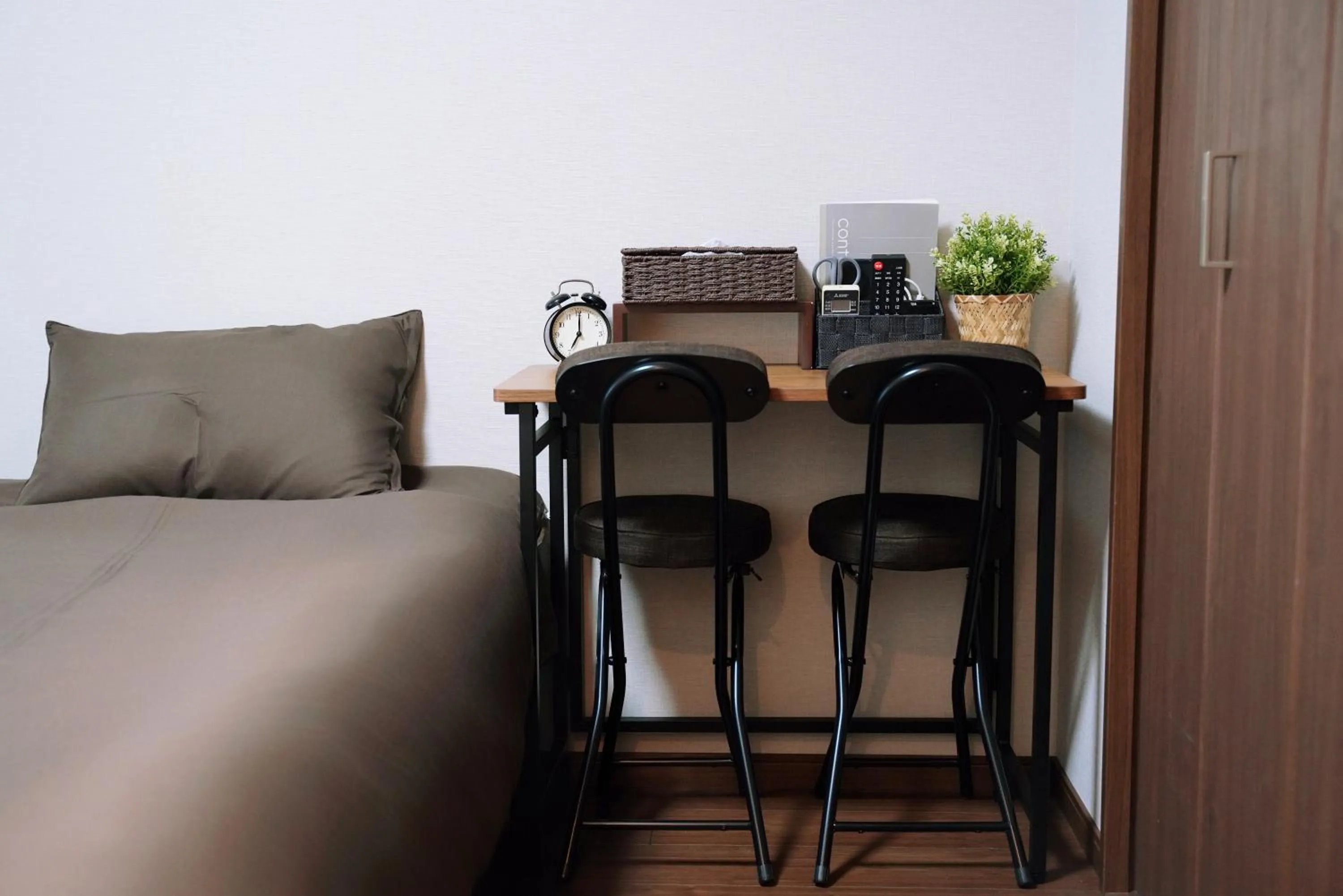 Bed in nestay apartment osaka ebisu