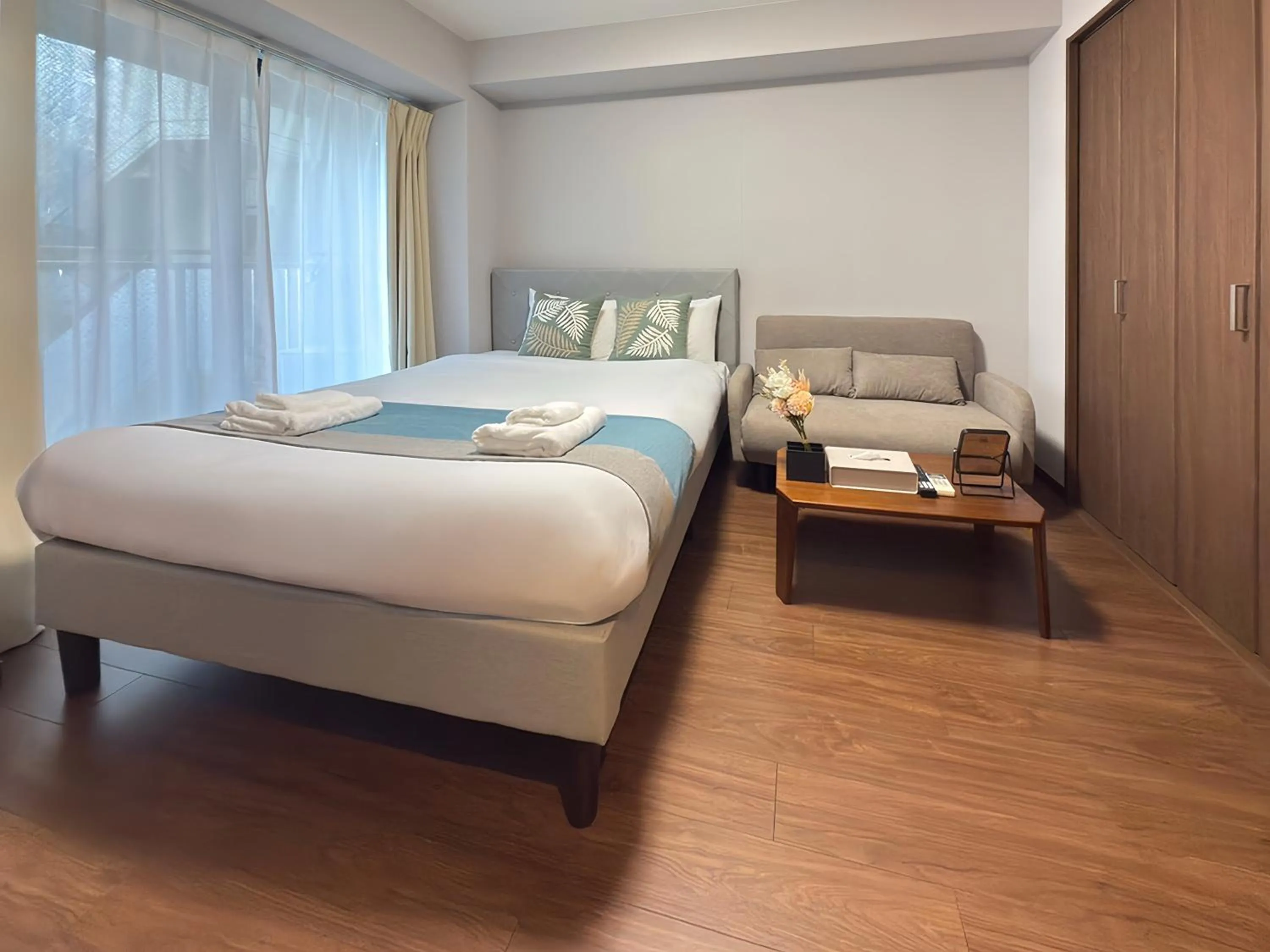 Bed in nestay apartment osaka ebisu