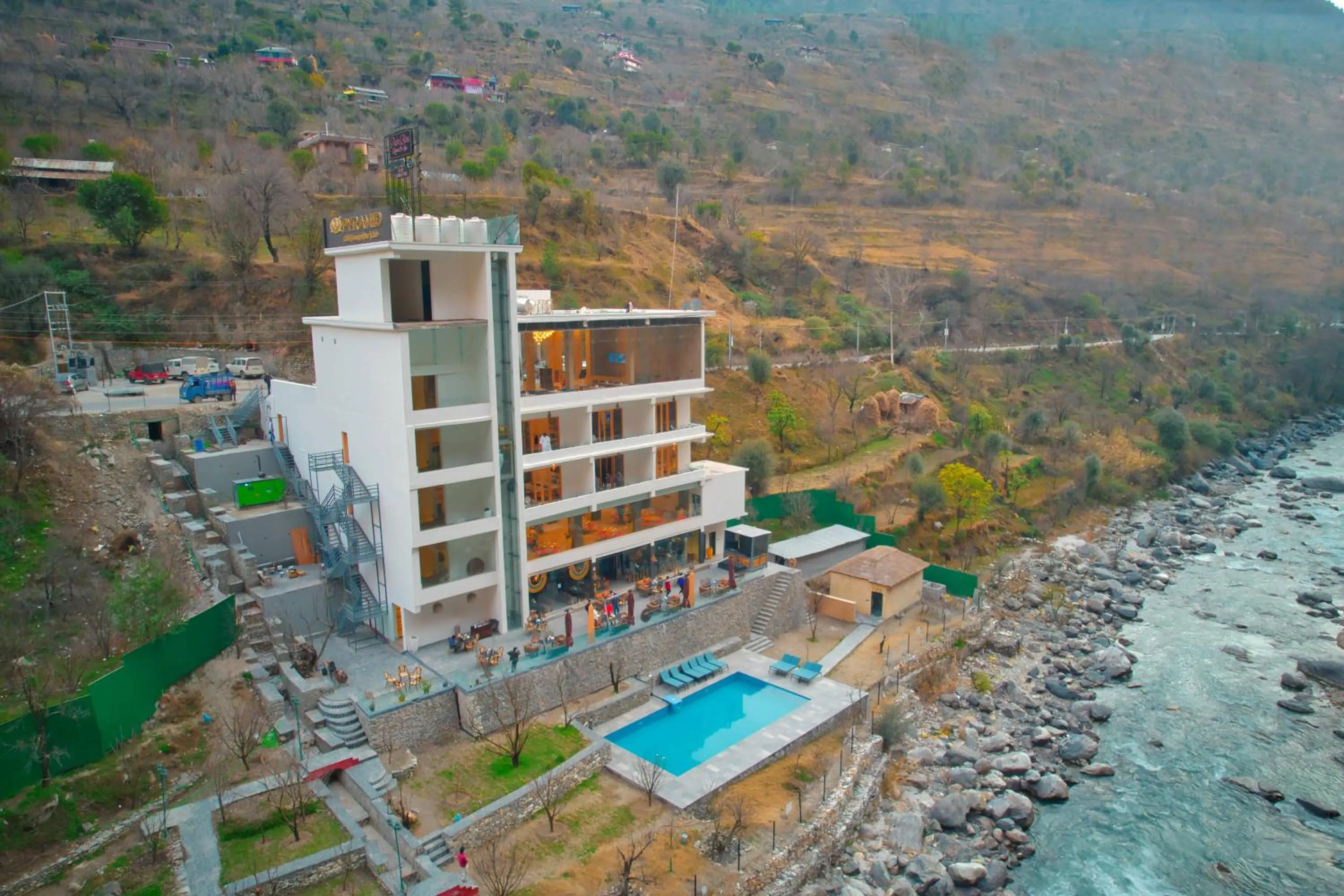 Property building in Echor Palm Bliss Riverside Resort & Spa Kasol