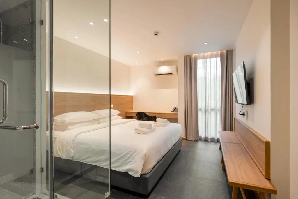 Bed in ZEN MASTER HOTEL