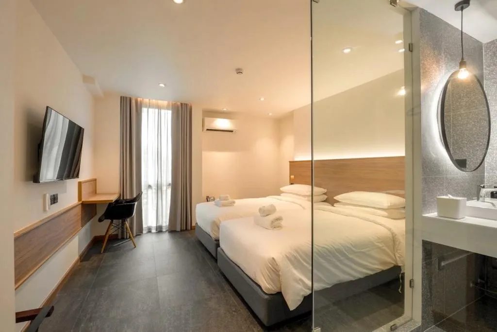 Bed in ZEN MASTER HOTEL