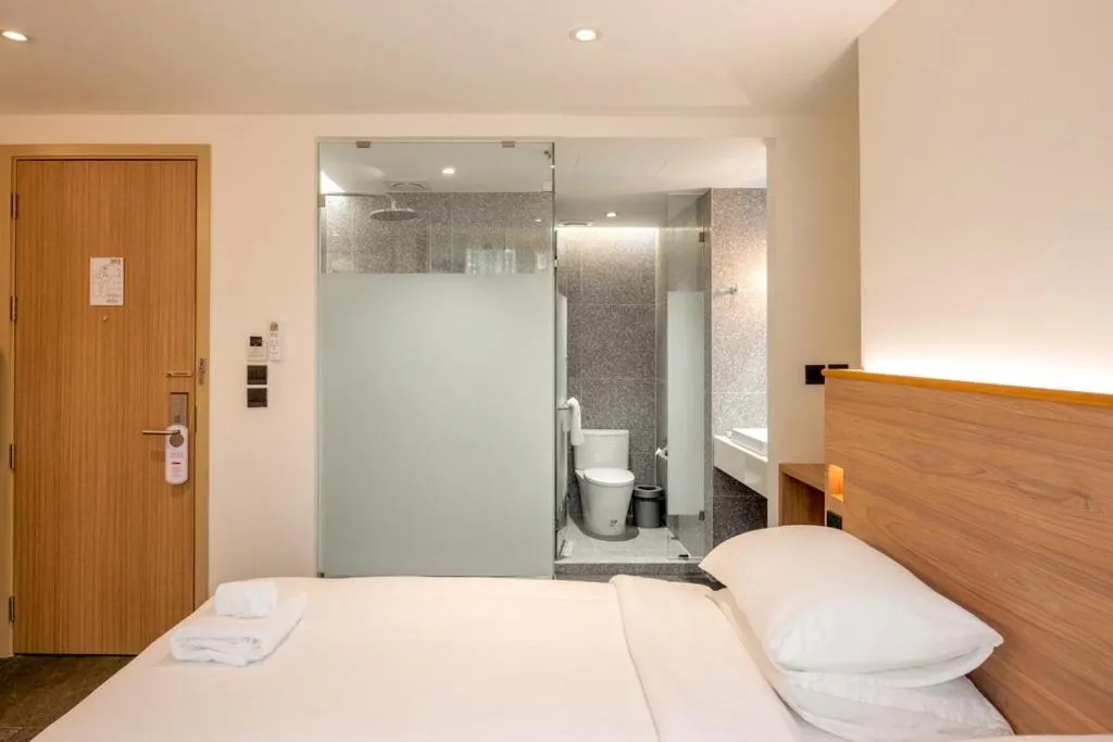 Bed in ZEN MASTER HOTEL