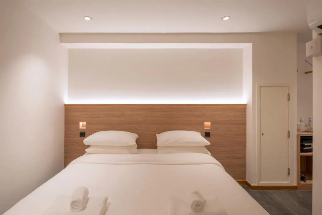 Bed in ZEN MASTER HOTEL