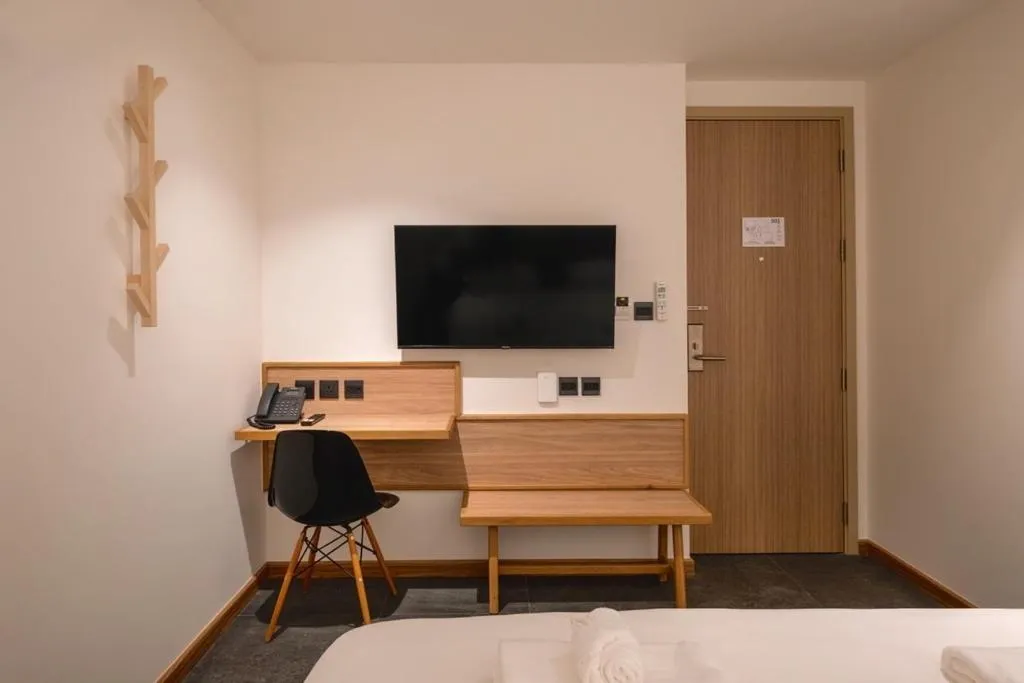 Bed in ZEN MASTER HOTEL