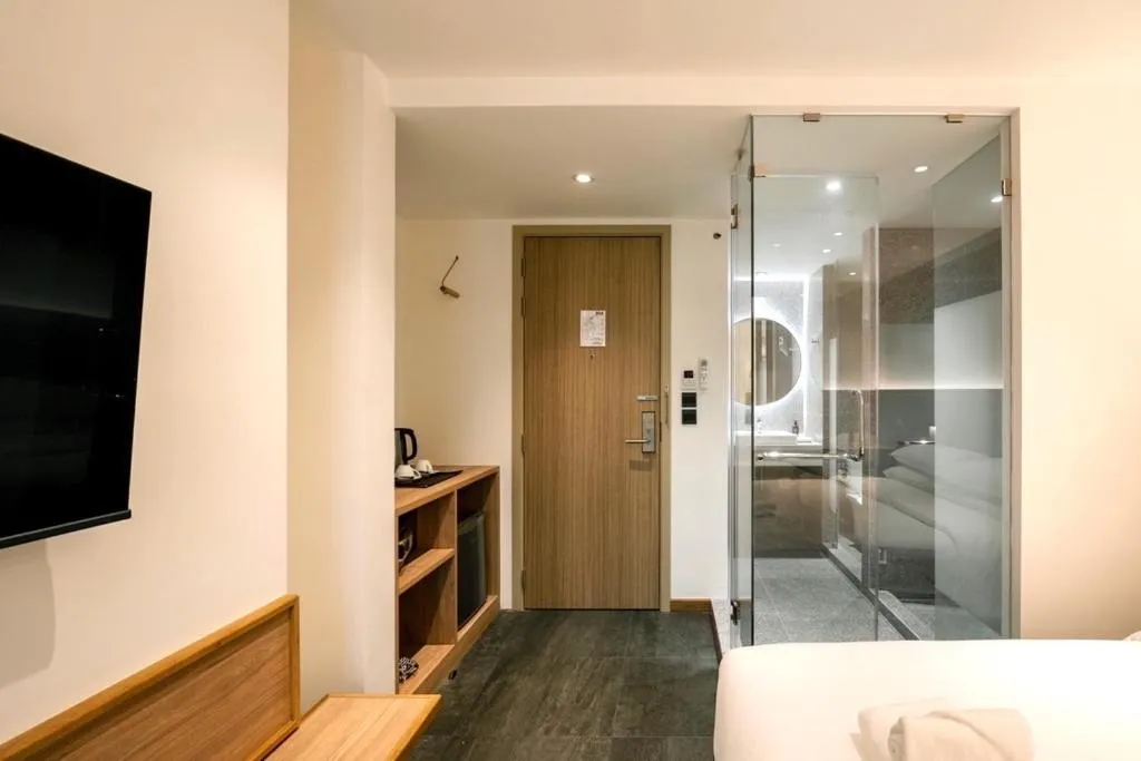 Bed in ZEN MASTER HOTEL