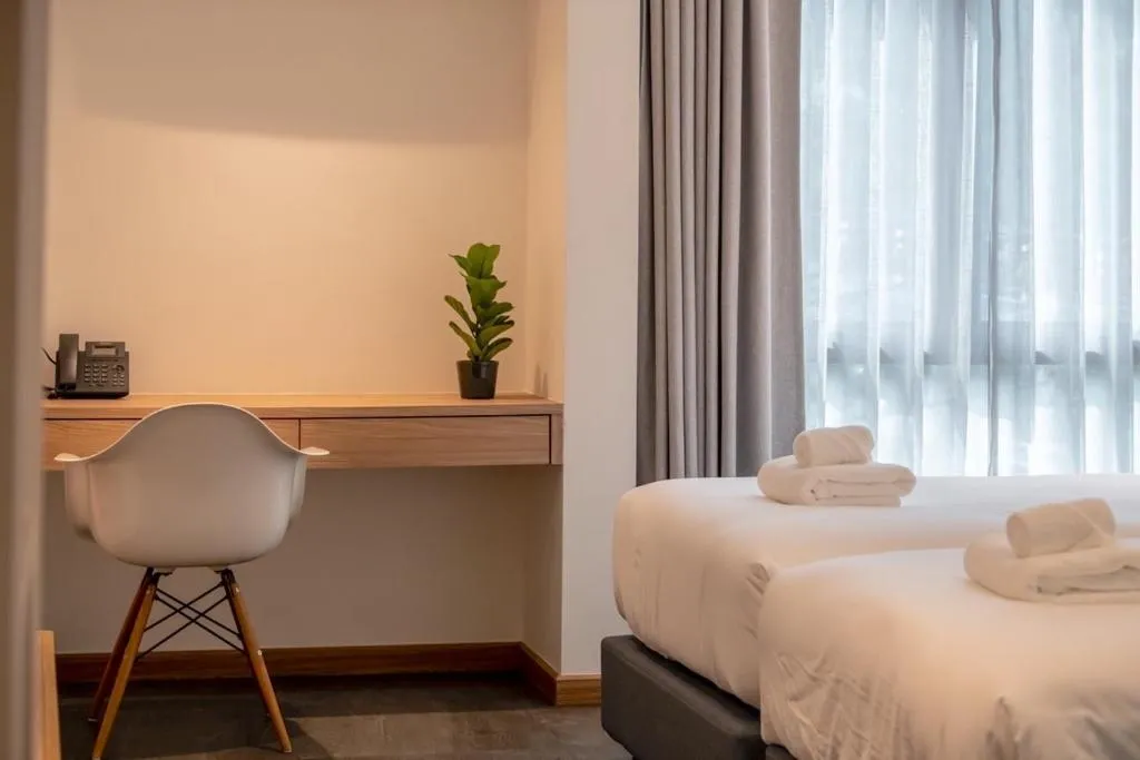 Bed in ZEN MASTER HOTEL